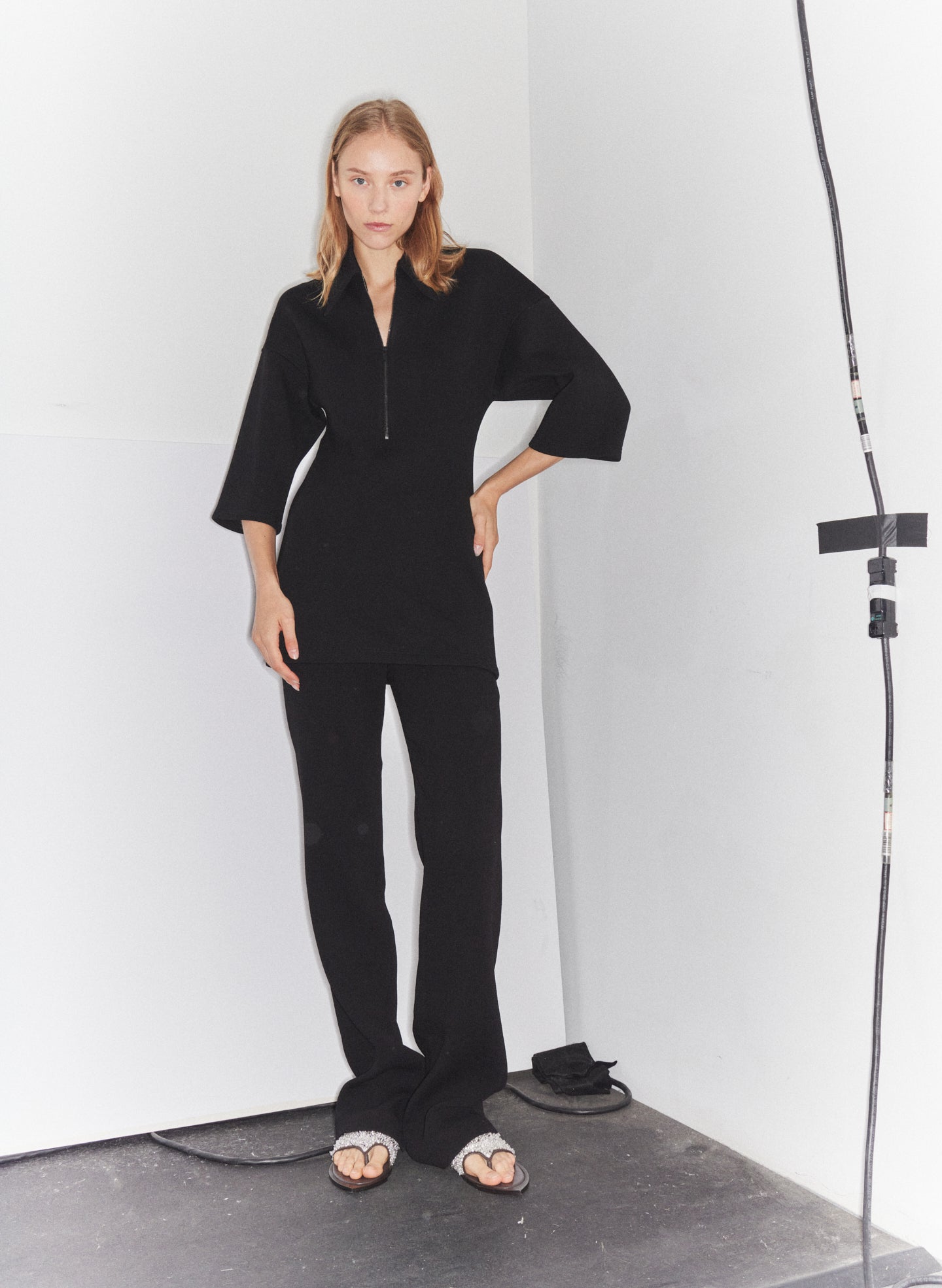 Black Bonded Viscose Zip Front Short Sleeve Slim Tunic - editorial campaign on model