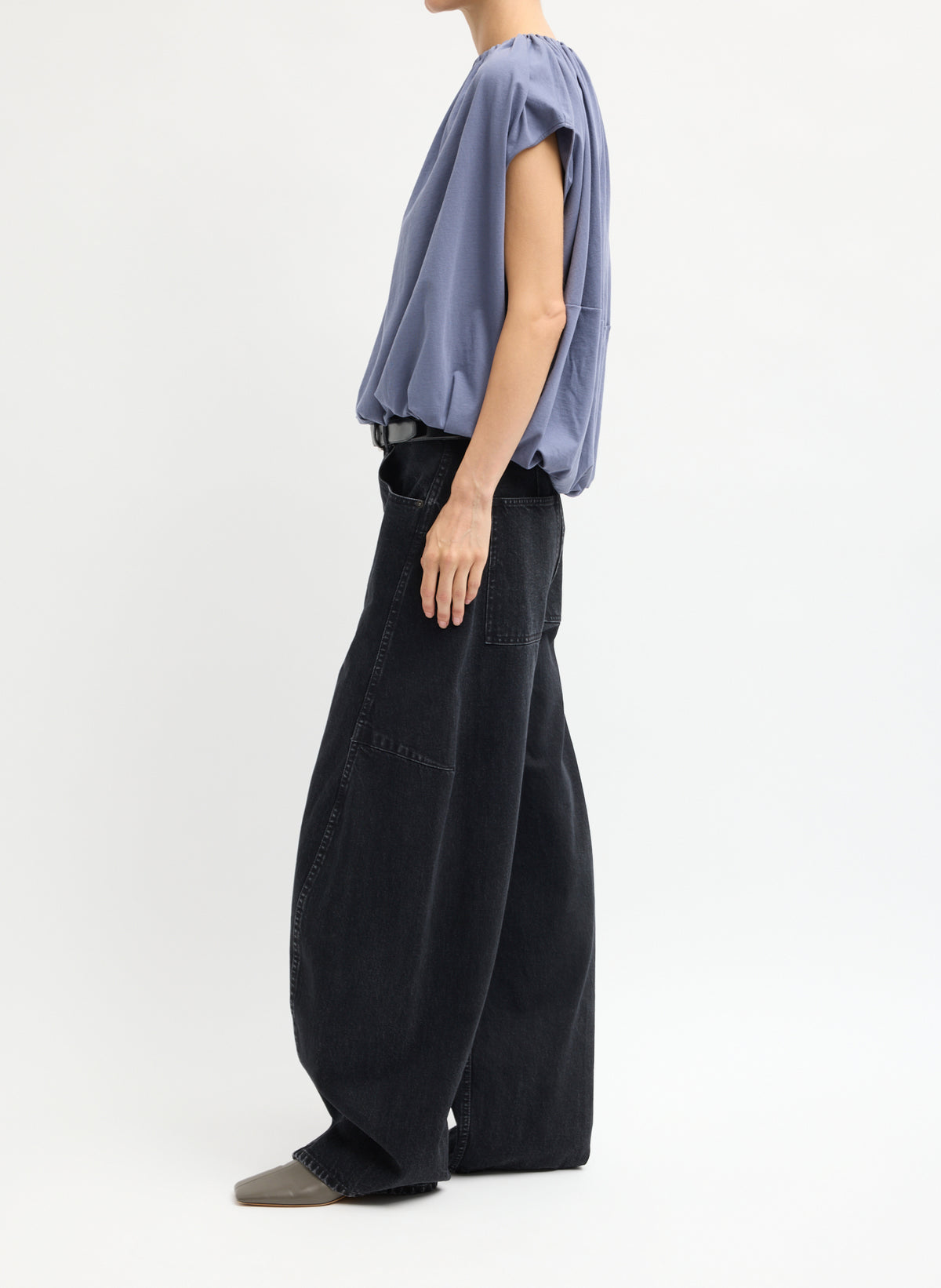 Black Denim Sid Jean - black wash barrel leg jean, side view on model