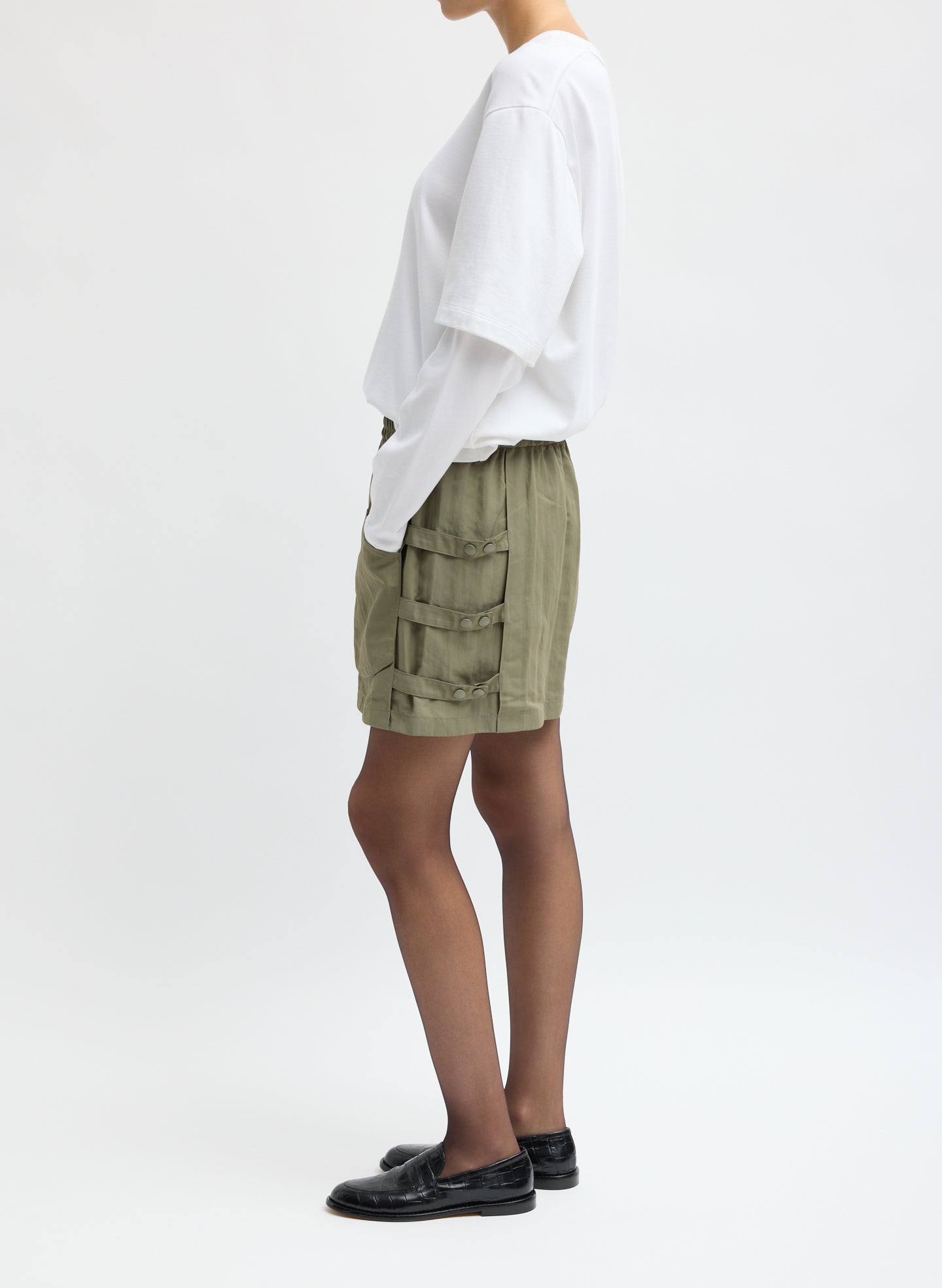 Dark Hazelnut Green Techy Twill Pull On Mini Skirt - side view on model