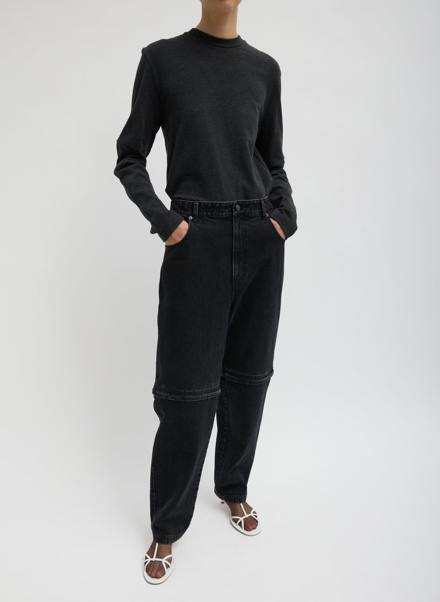 Black Denim Lars Convertible Zip Jean - zipped, front view on model