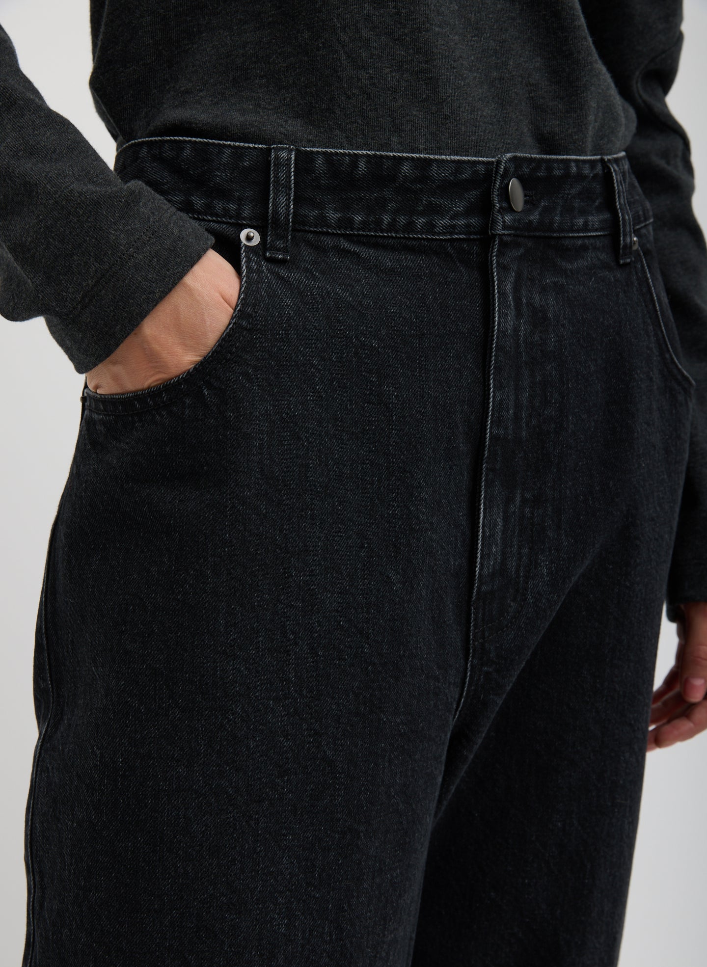 Black Denim Lars Convertible Zip Jean - closeup of front