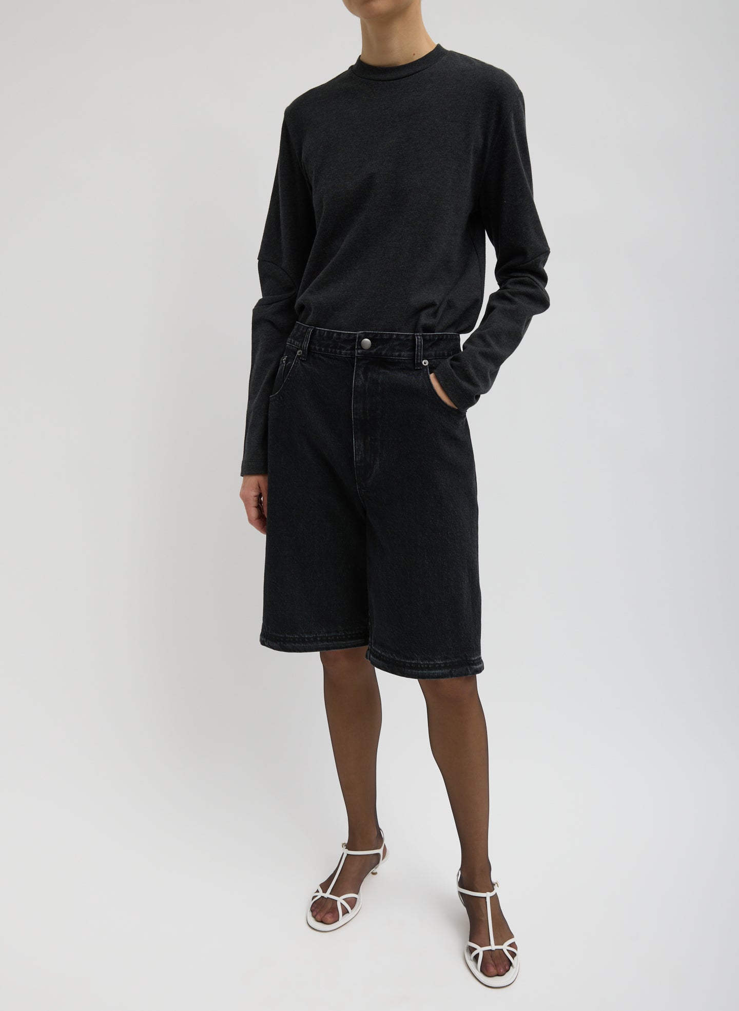 Black Denim Lars Convertible Zip Jean - shorts, front view on model