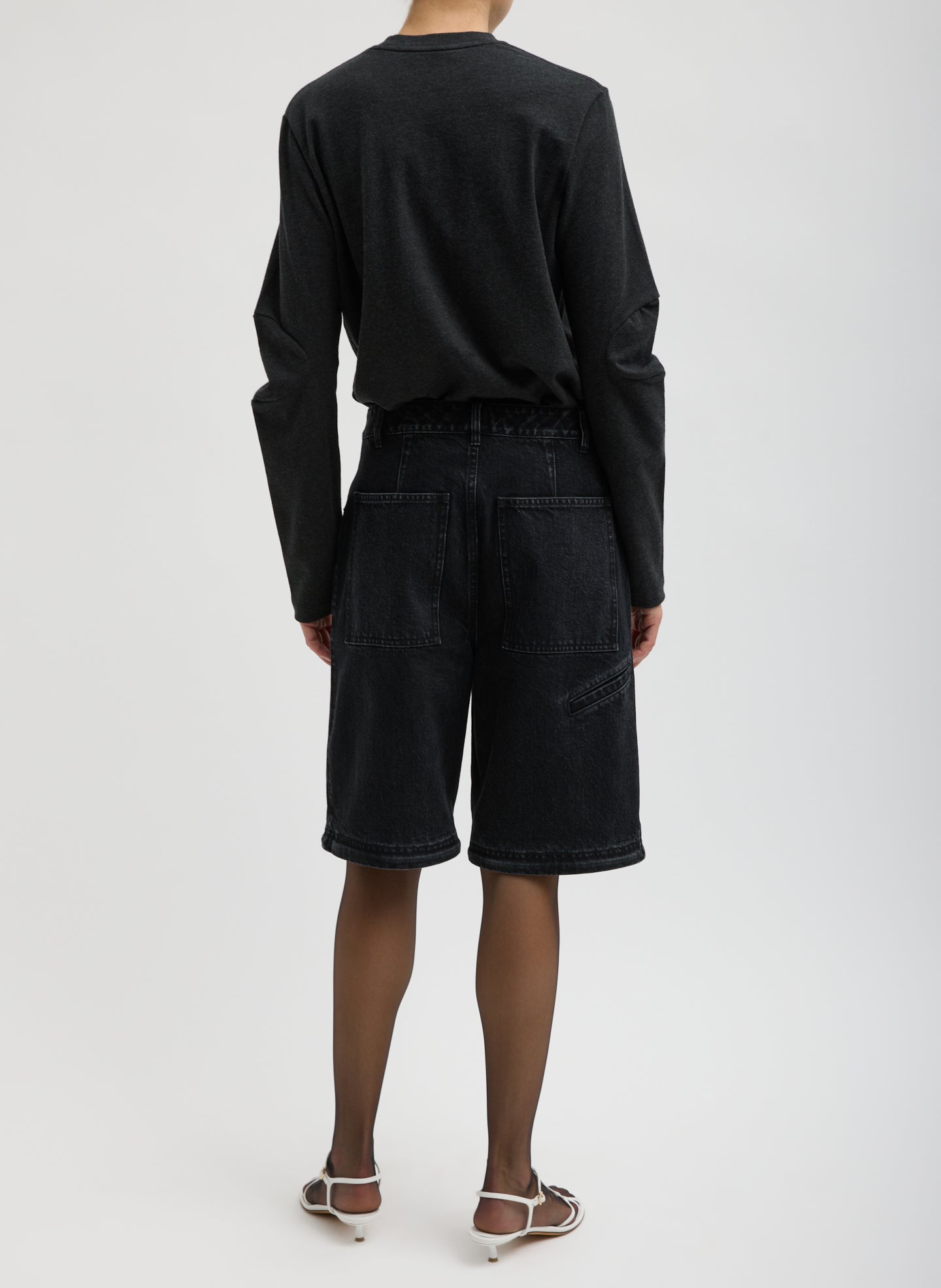 Black Denim Lars Convertible Zip Jean - shorts, back view on model