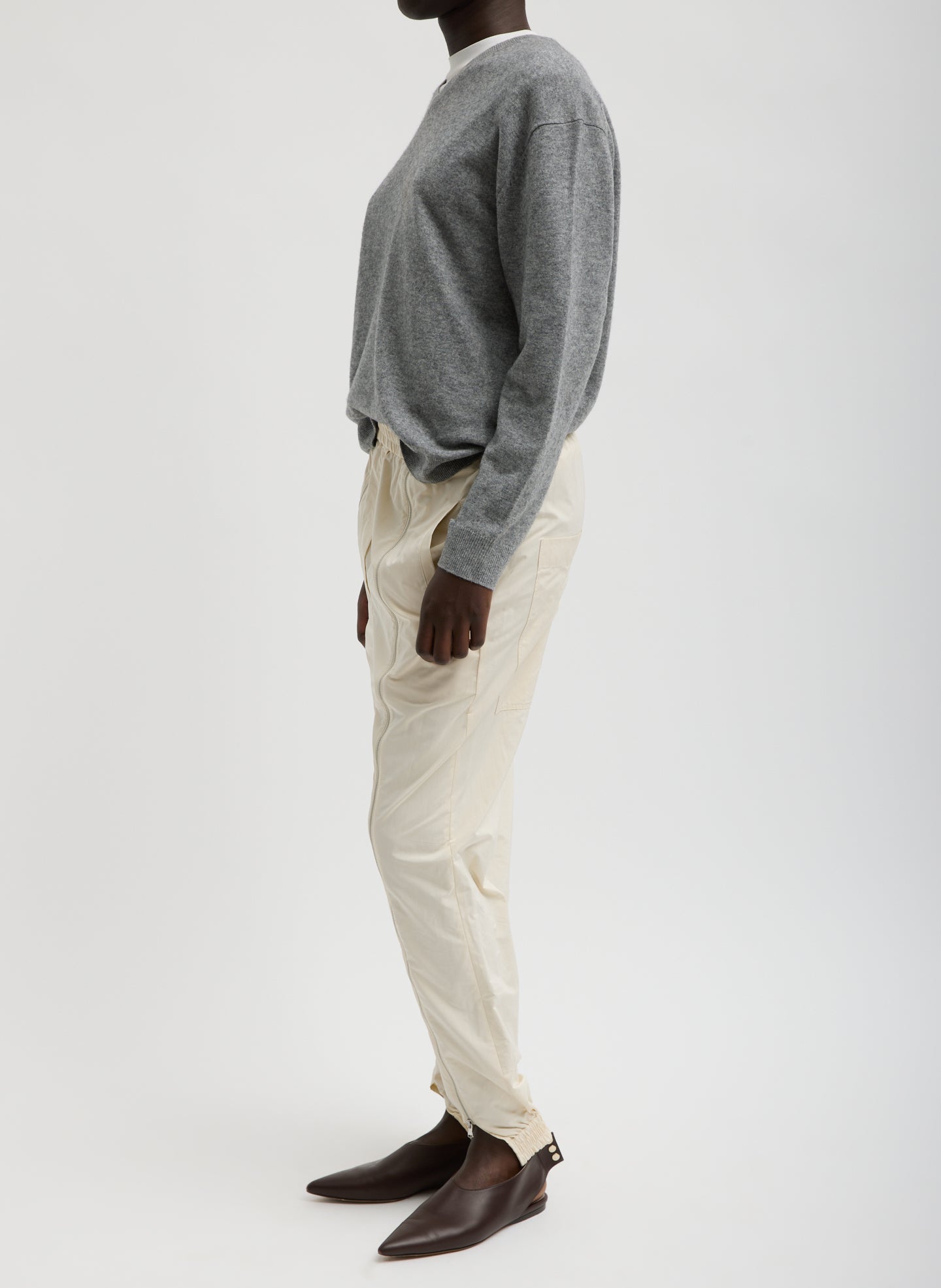 Ivory Nylon Zipper Jogger - full look, side view on model