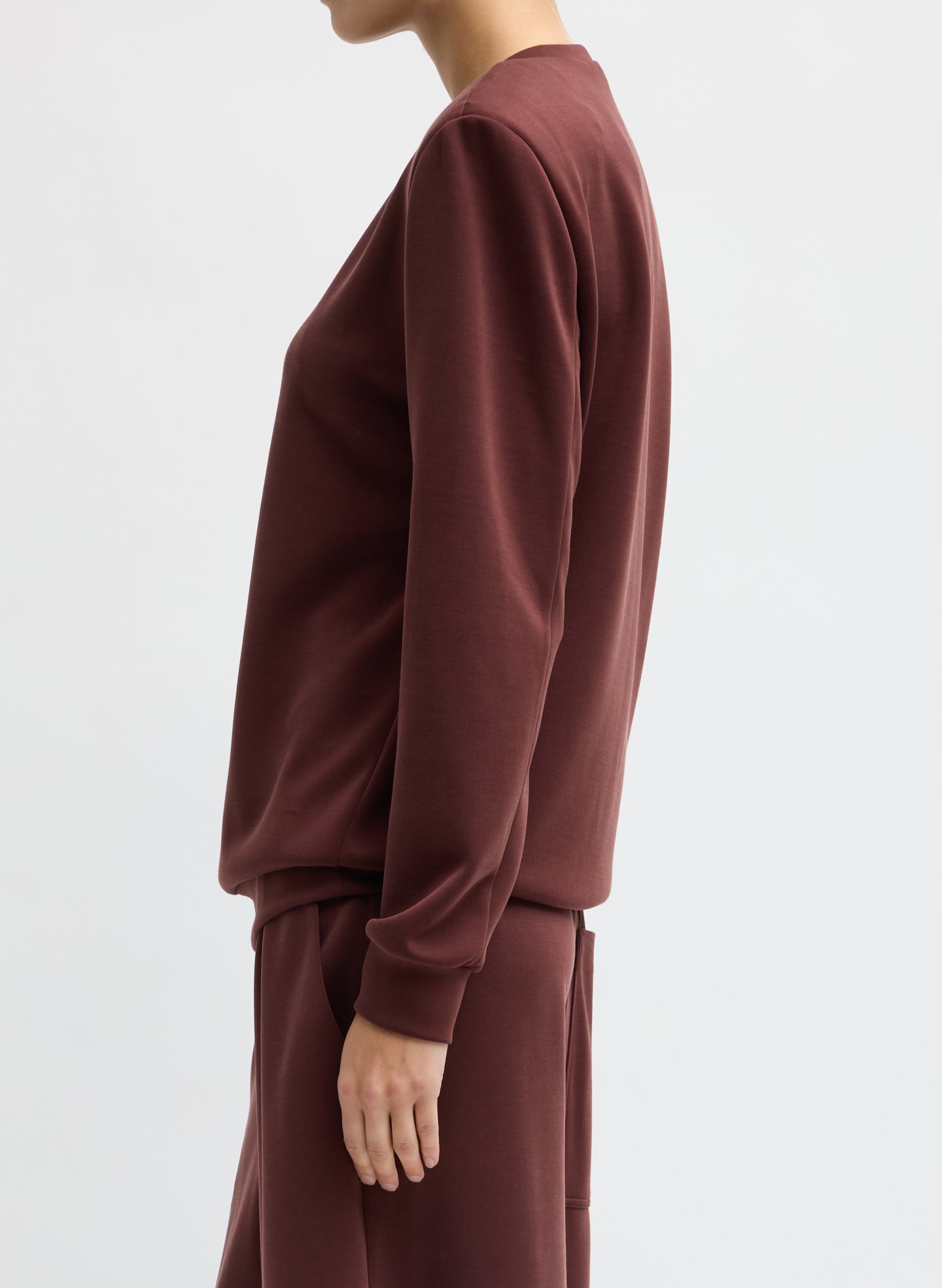 Burgundy Feather Weight Viscose Removable Shoulder Pad Long Sleeve T-Shirt - side view on model