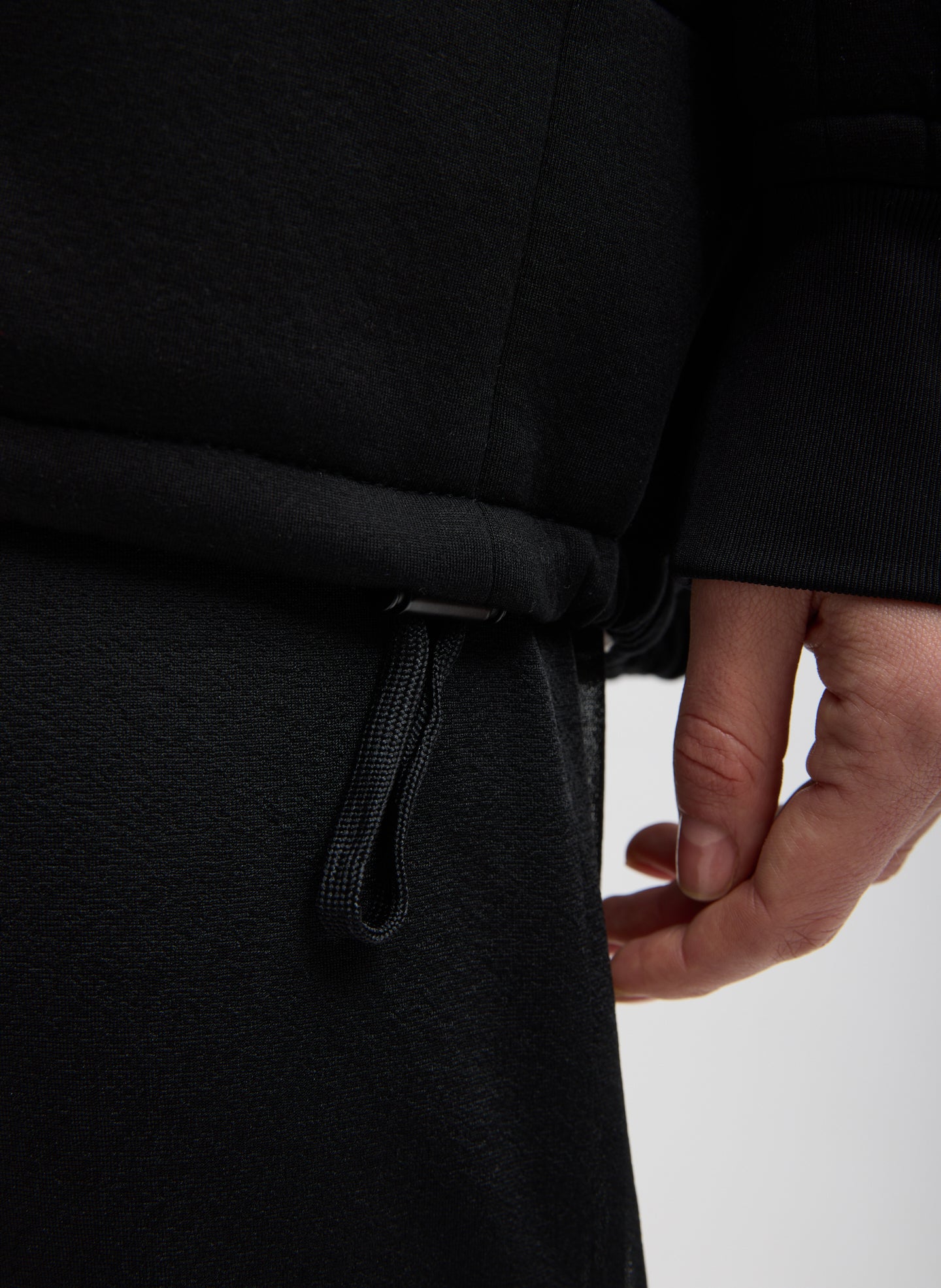 Black Techy Viscose Zip Up Hoodie - closeup of drawstring detail at hem