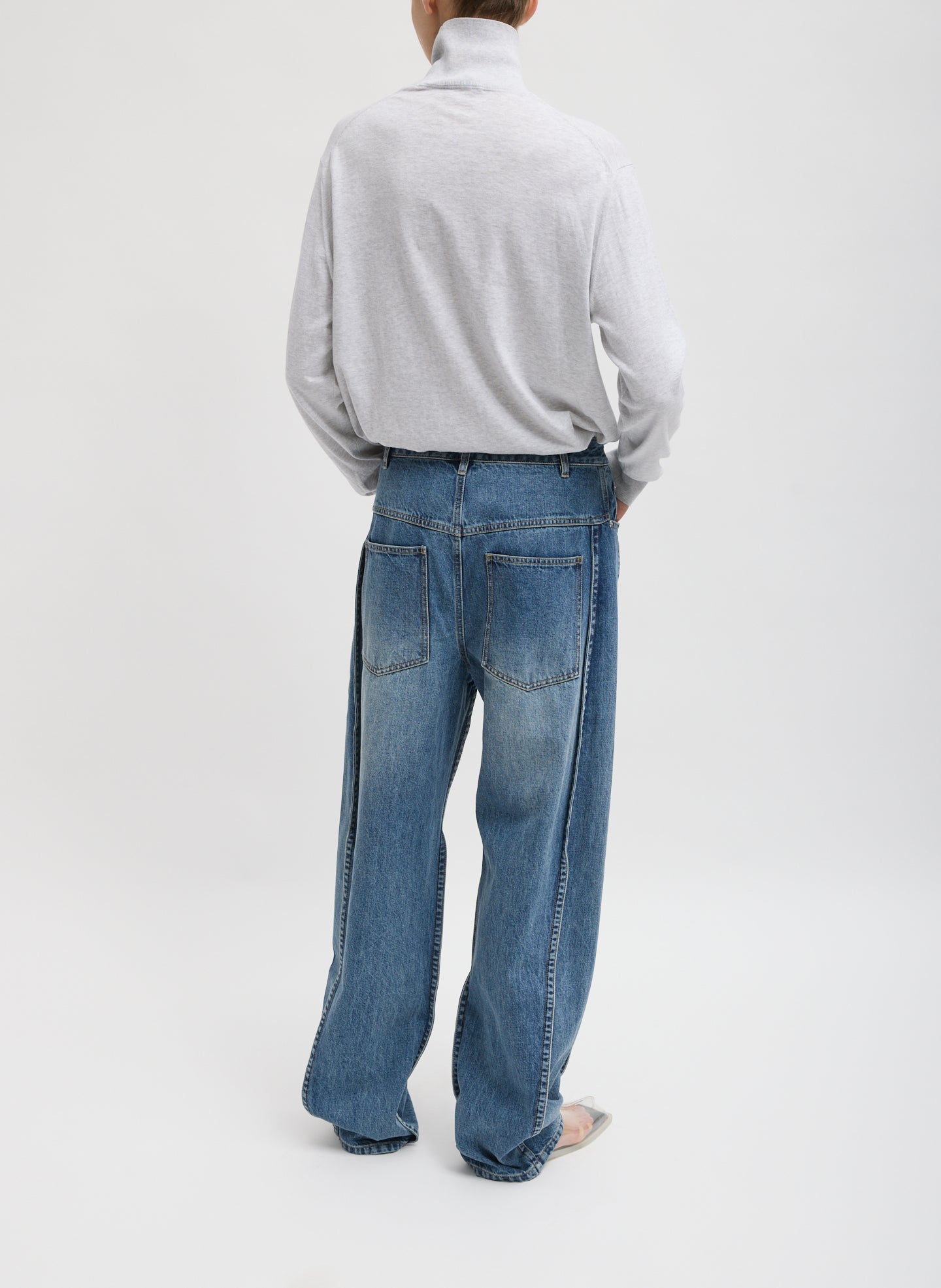 Classic Blue Spring Denim Tuck Jean - barrel leg, back view on model