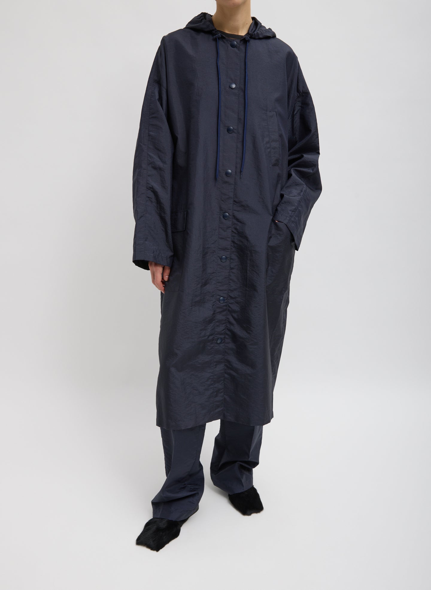Navy Crispy Nylon Hooded Coat - lightweight long jacket, front view on model