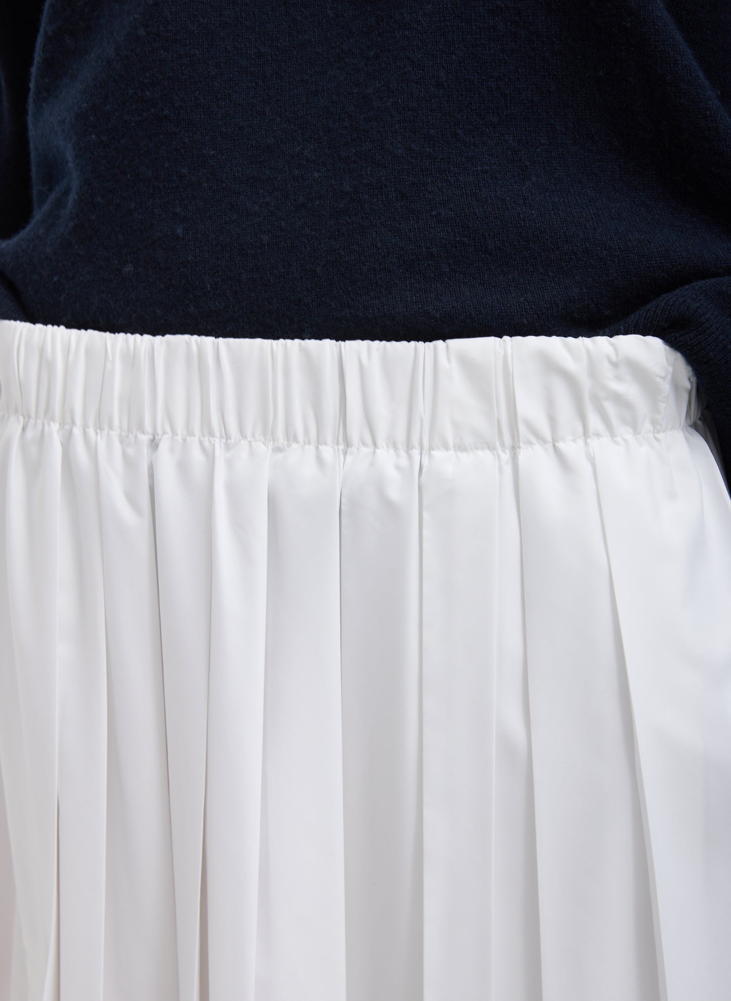 White Nylon Pleated Pull On Skirt - closeup of waistband and pleat details