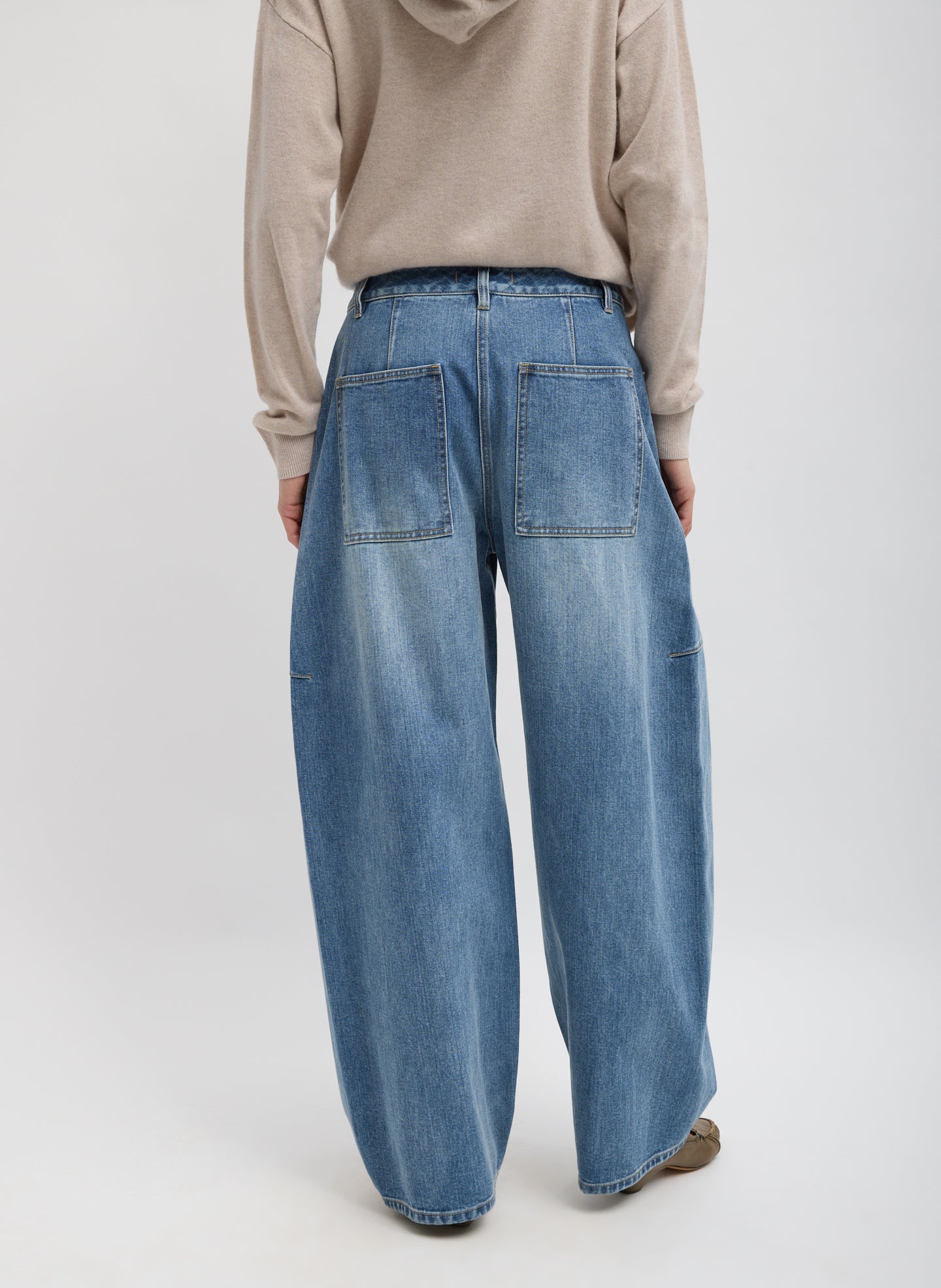 Blue Classic Wash Denim Sid Jean - barrel leg, back view on model