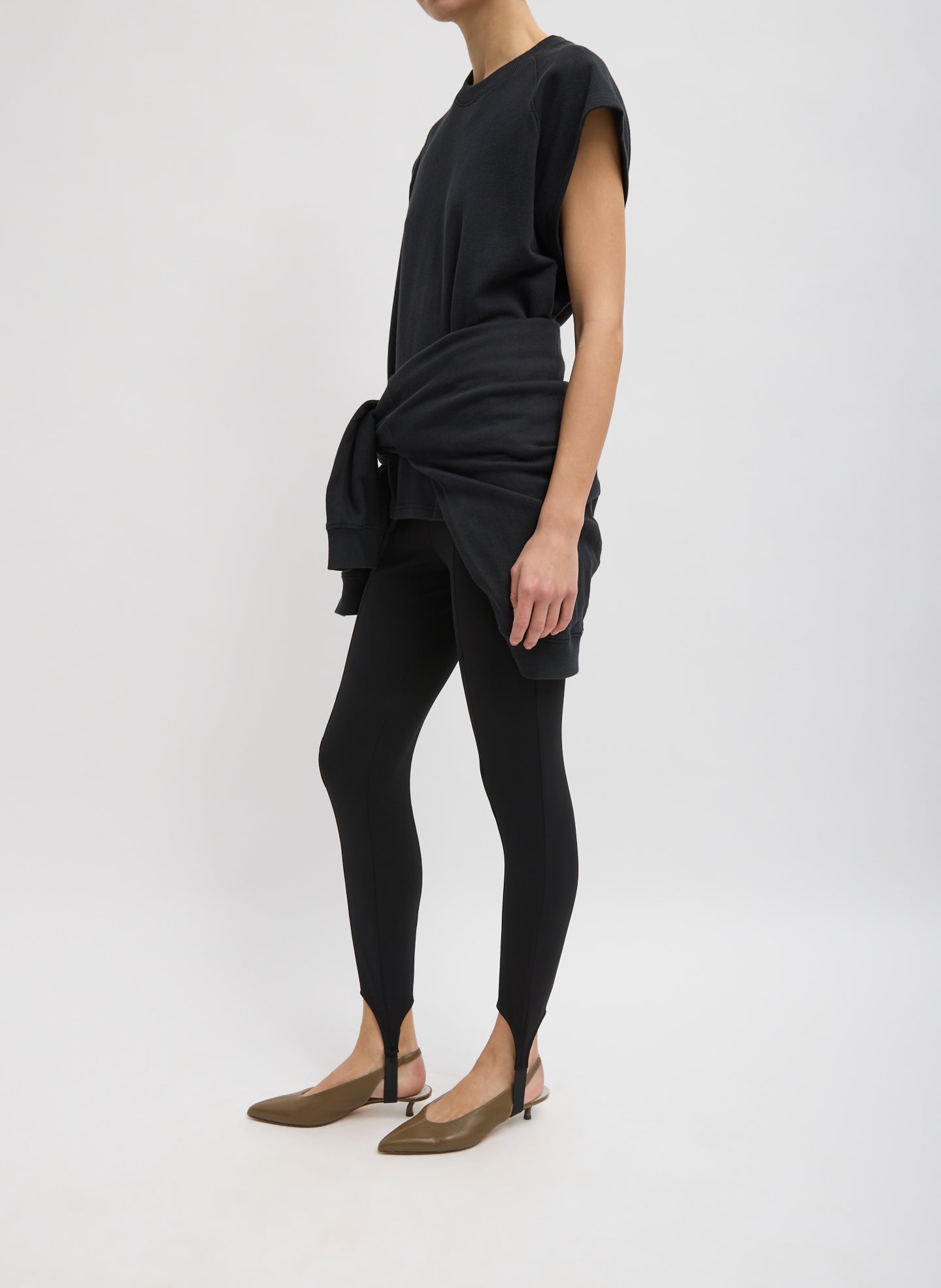 Black Compact Ultra Stretch Knit Stirrup Legging - full look, side view on model