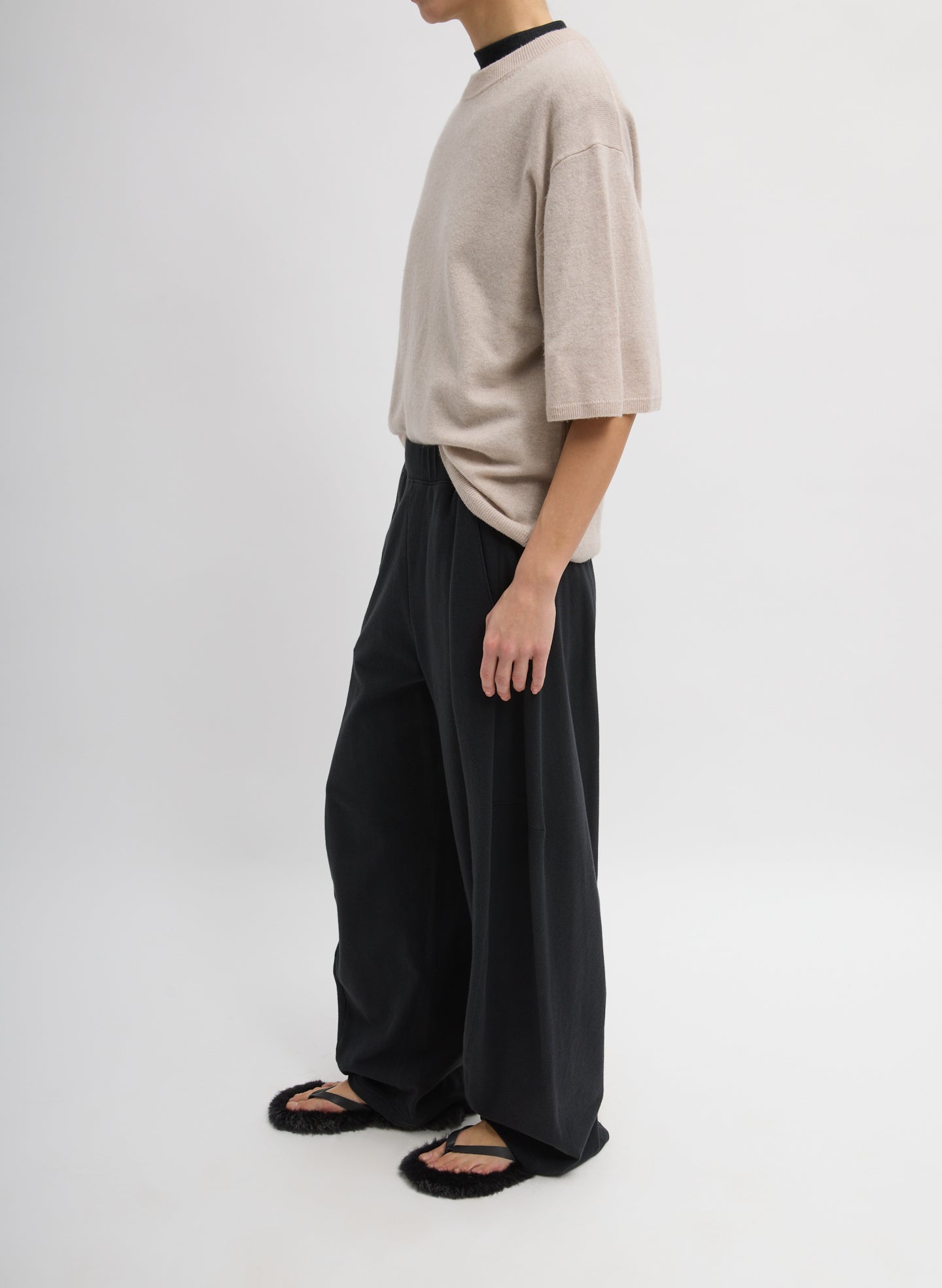 Black Light Weight Sweatshirting Winslow Pant - barrel leg lounge pant, side view on model