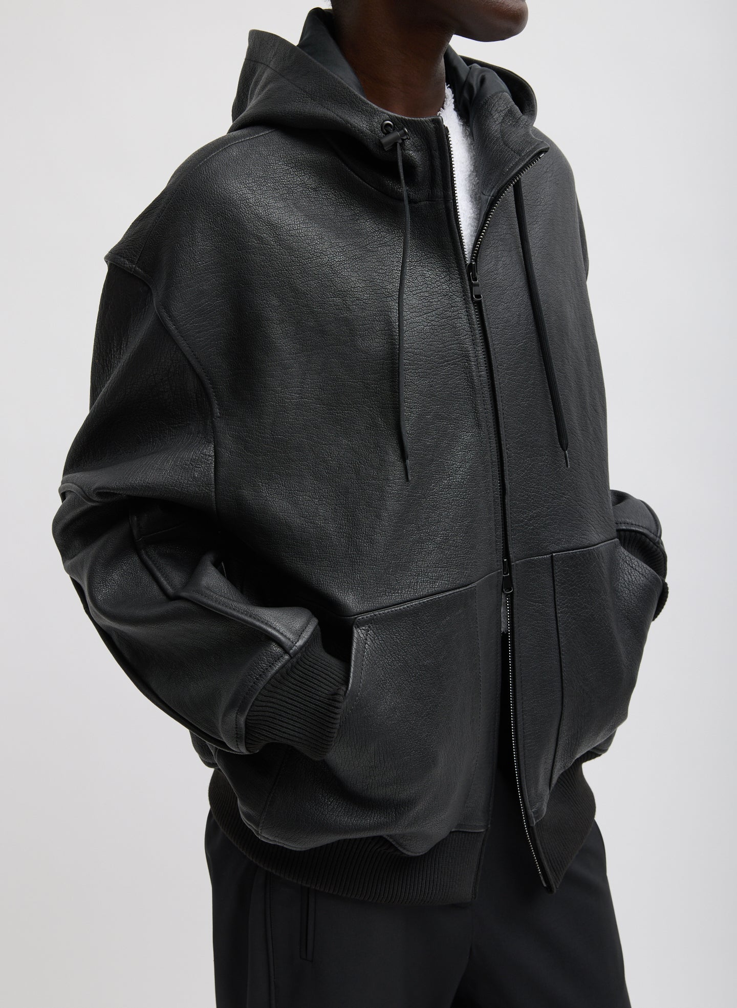 Black Pebbled Leather Zip Up Hoodie Jacket - side view on model
