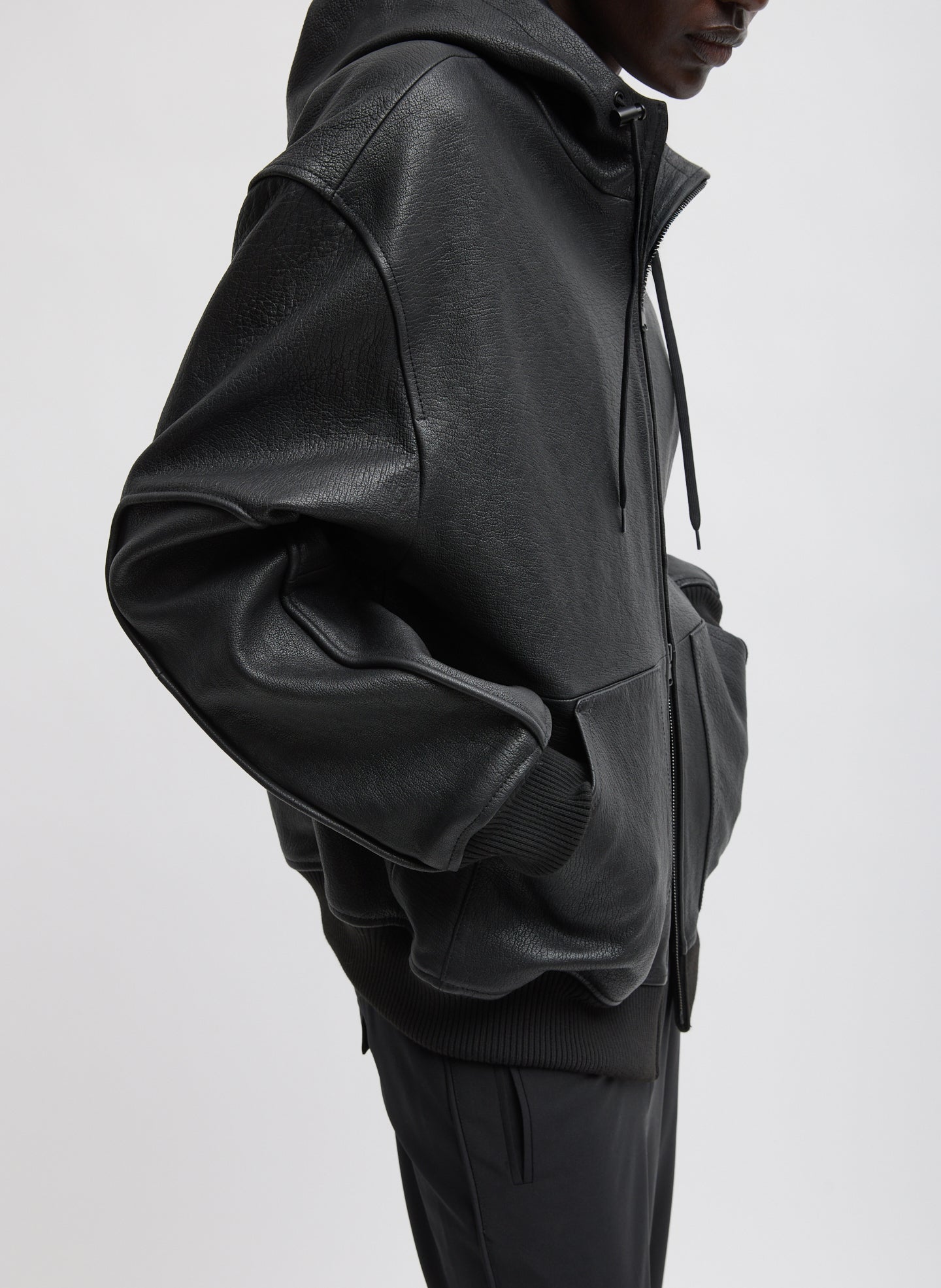 Black Pebbled Leather Zip Up Hoodie Jacket - side view on model