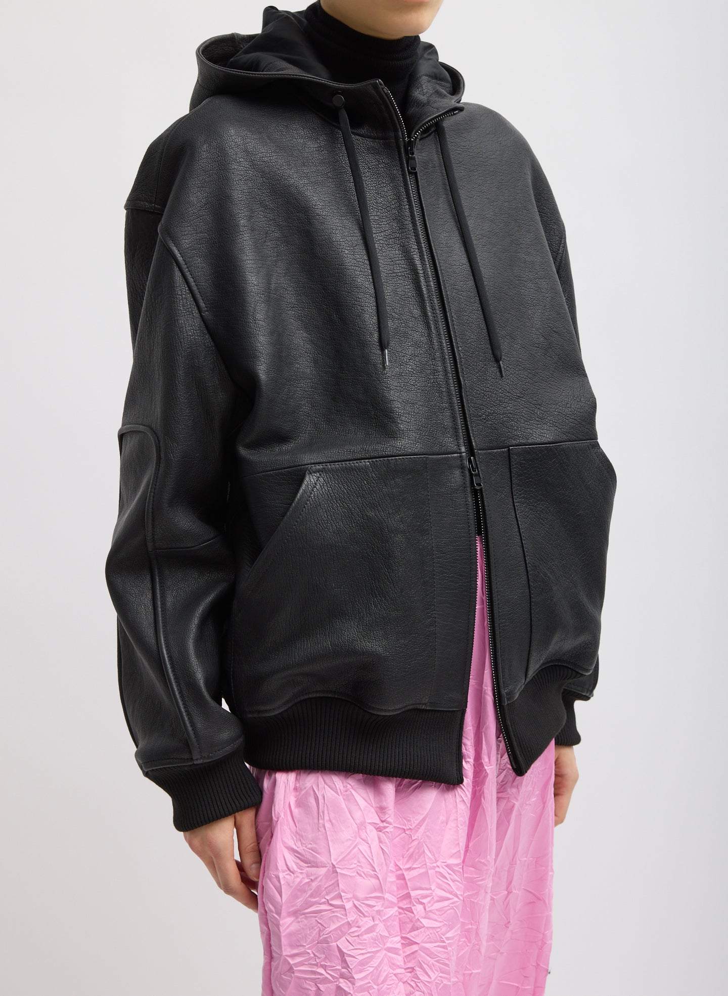Black Pebbled Leather Zip Up Hoodie Jacket - three-quarter view on model