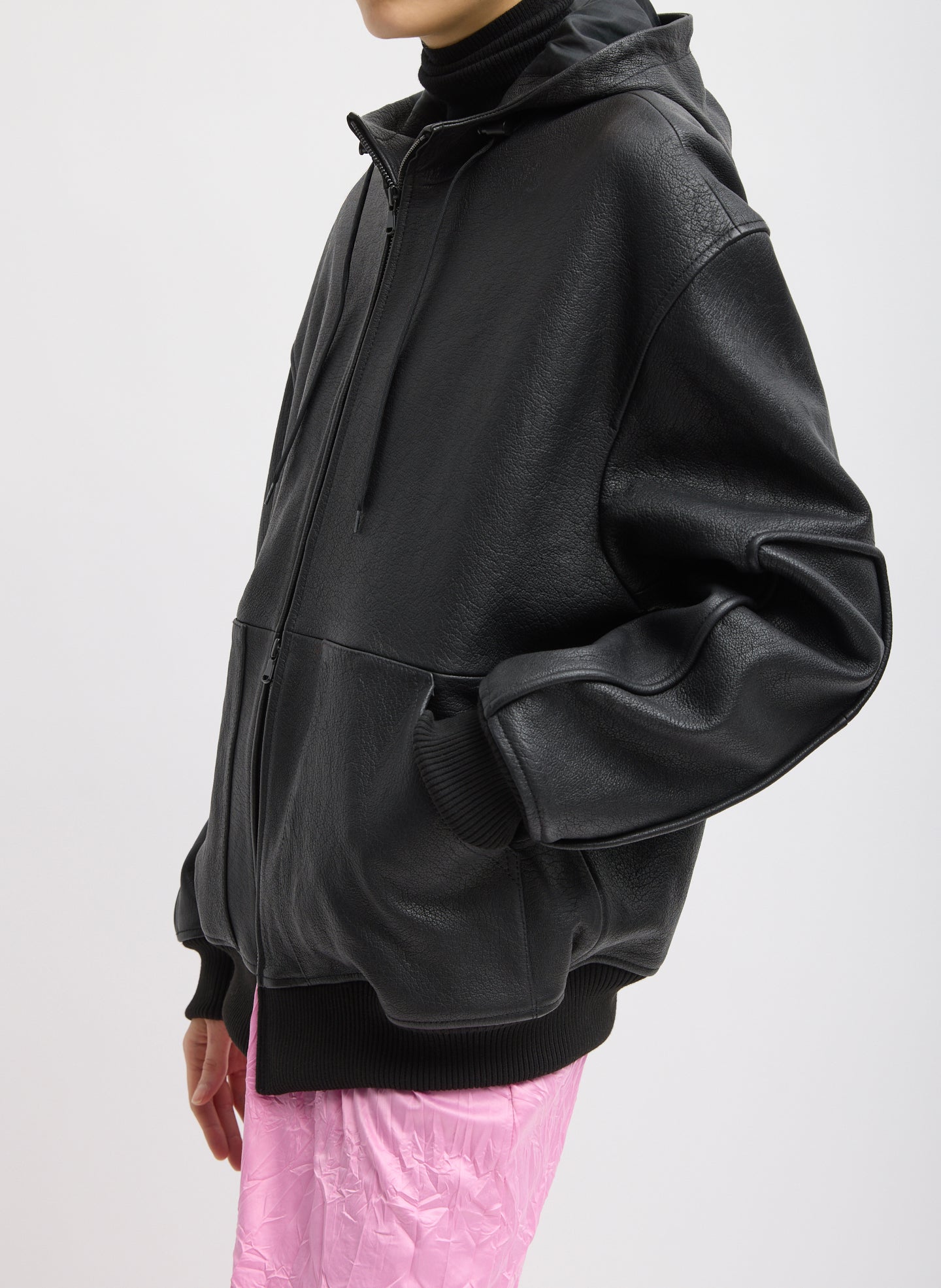 Black Pebbled Leather Zip Up Hoodie Jacket - side view on model