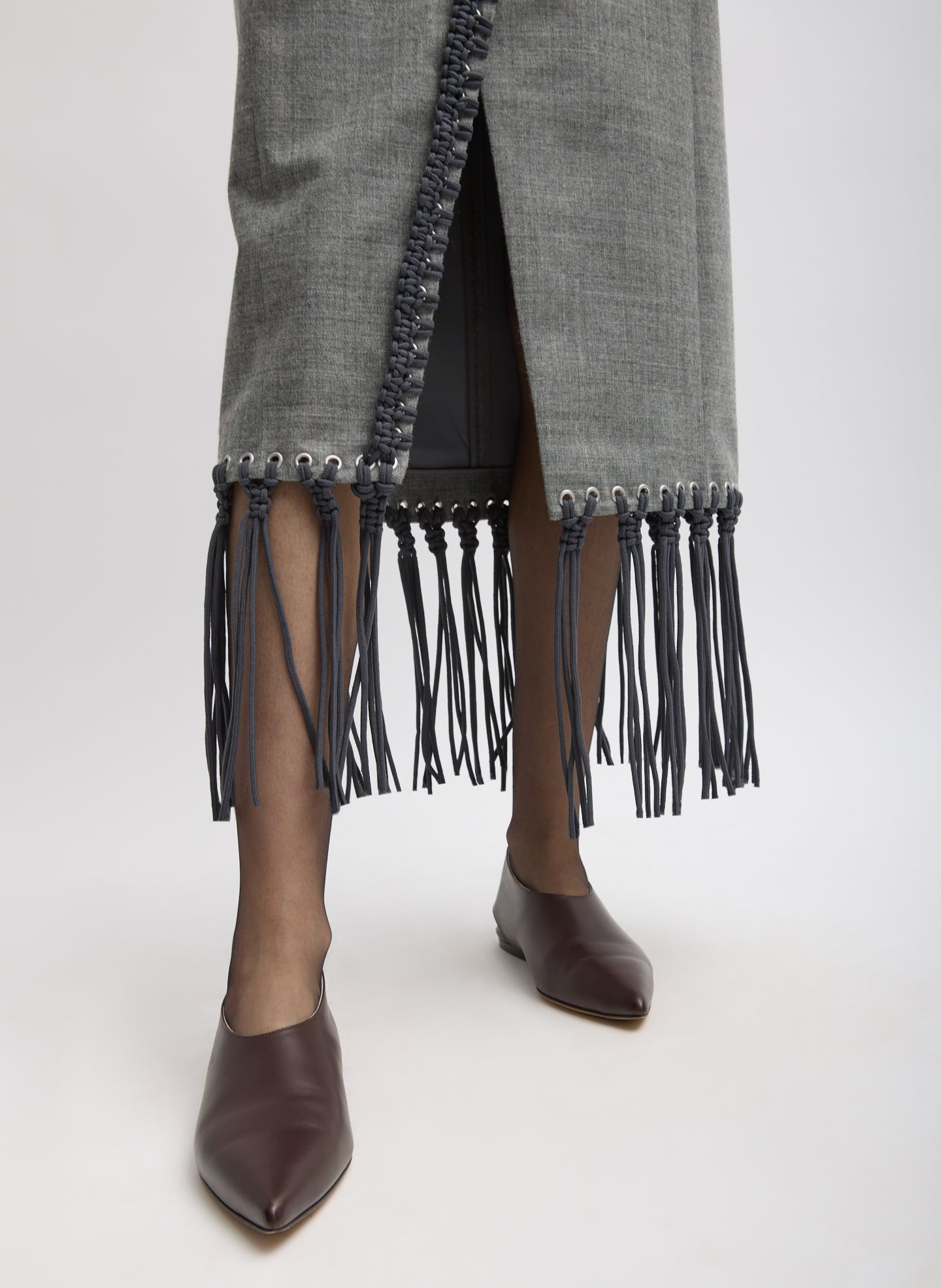 Grey Techy Bonded Wool Crochet Trim Skirt - closeup of crochet fringe at hem