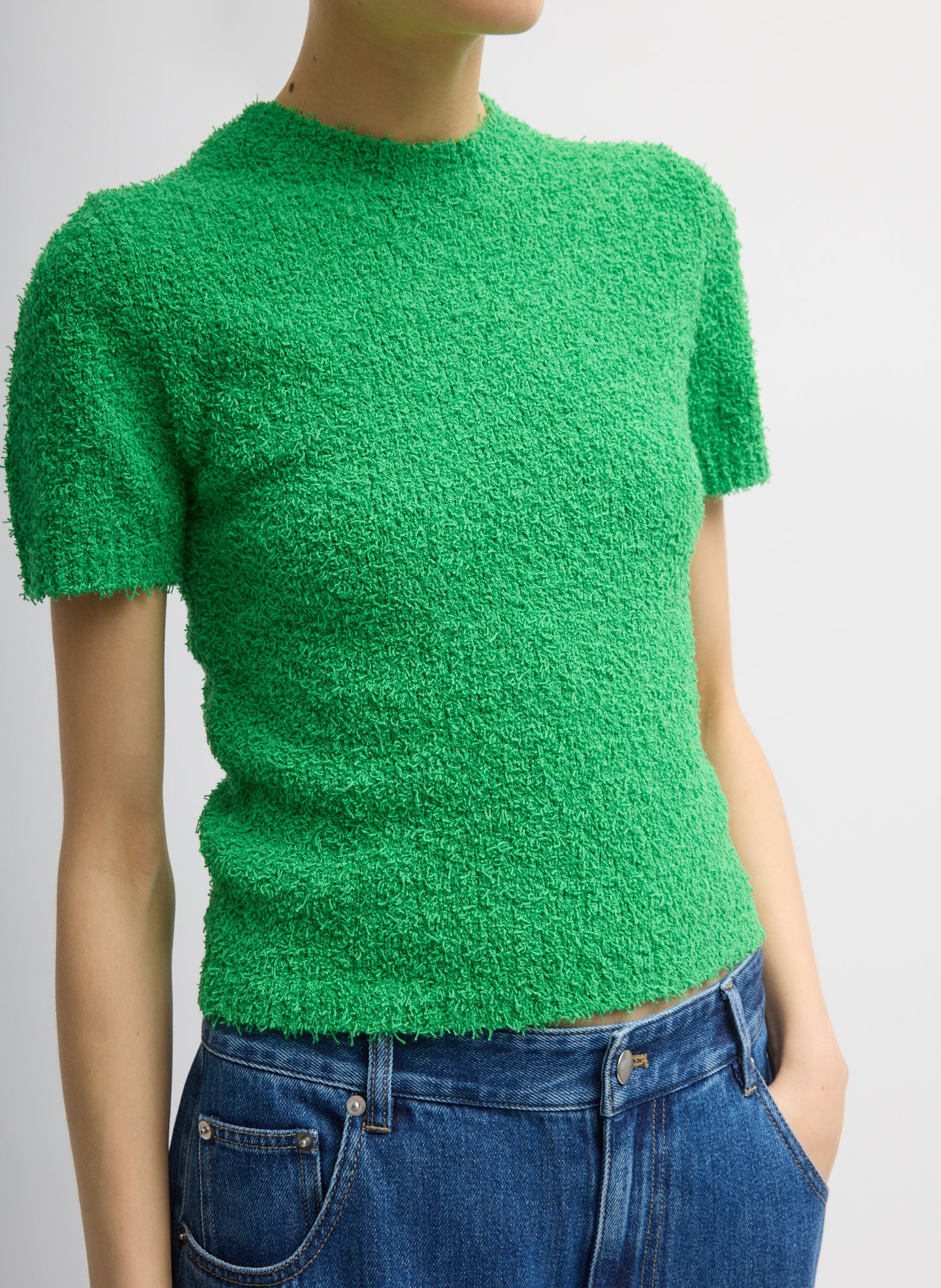 Green Serviette Baby T-Shirt - three-quarter view on model