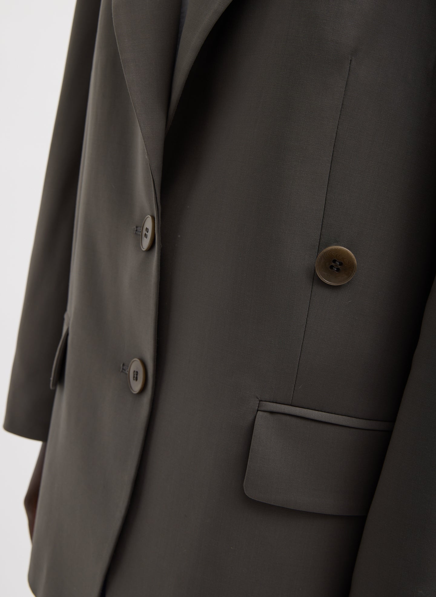 Dark Stone Grey Tropical Wool Liam Blazer - closeup of button details at front