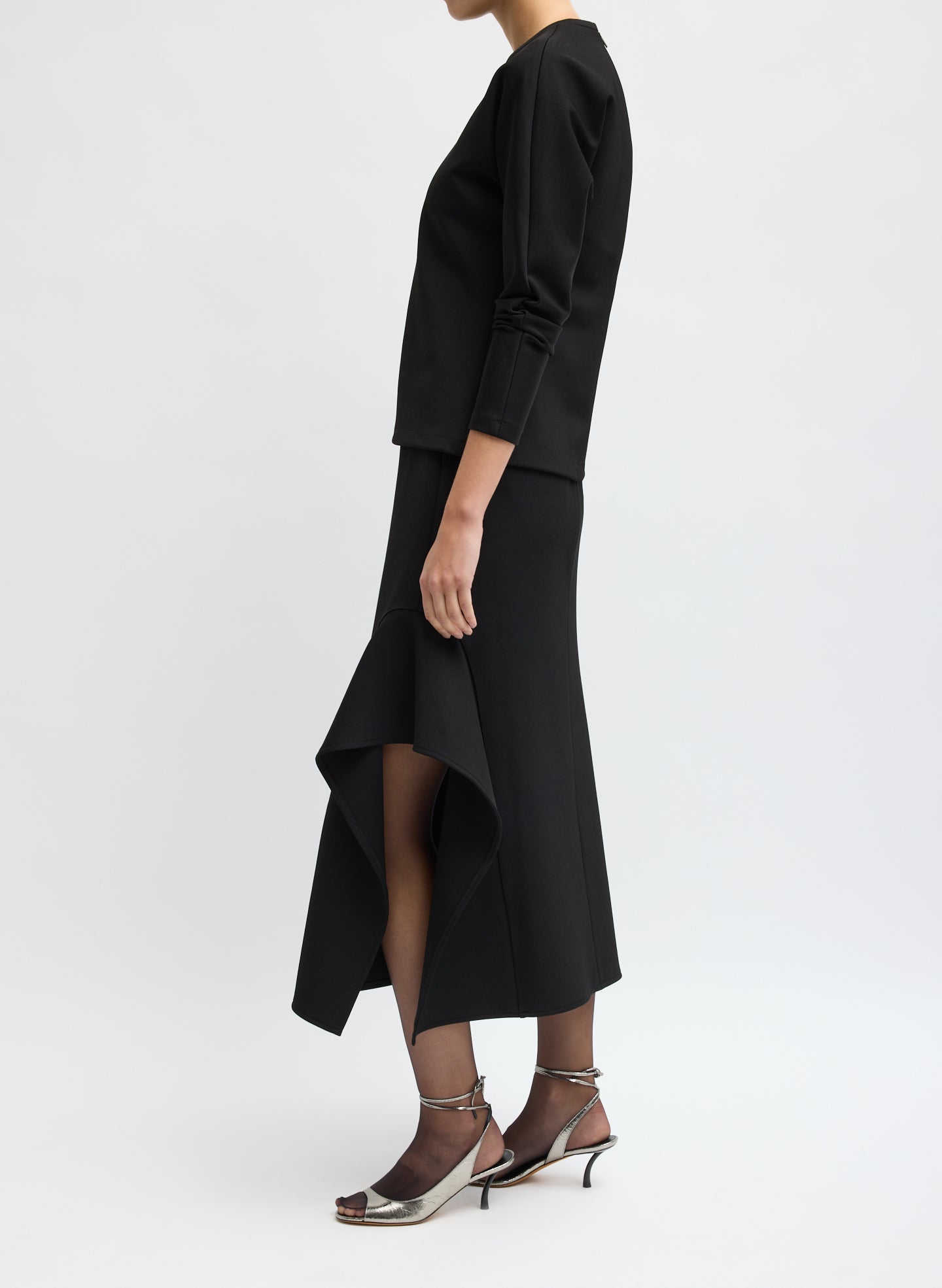 Black Luxe Crepe Knit Side Drape Skirt - side view on model