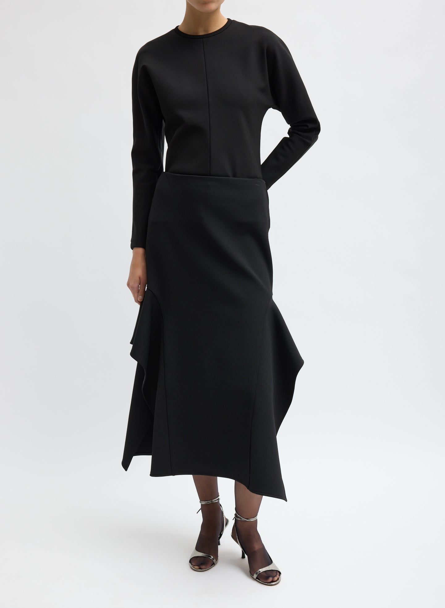 Black Luxe Crepe Knit Side Drape Skirt - front view on model