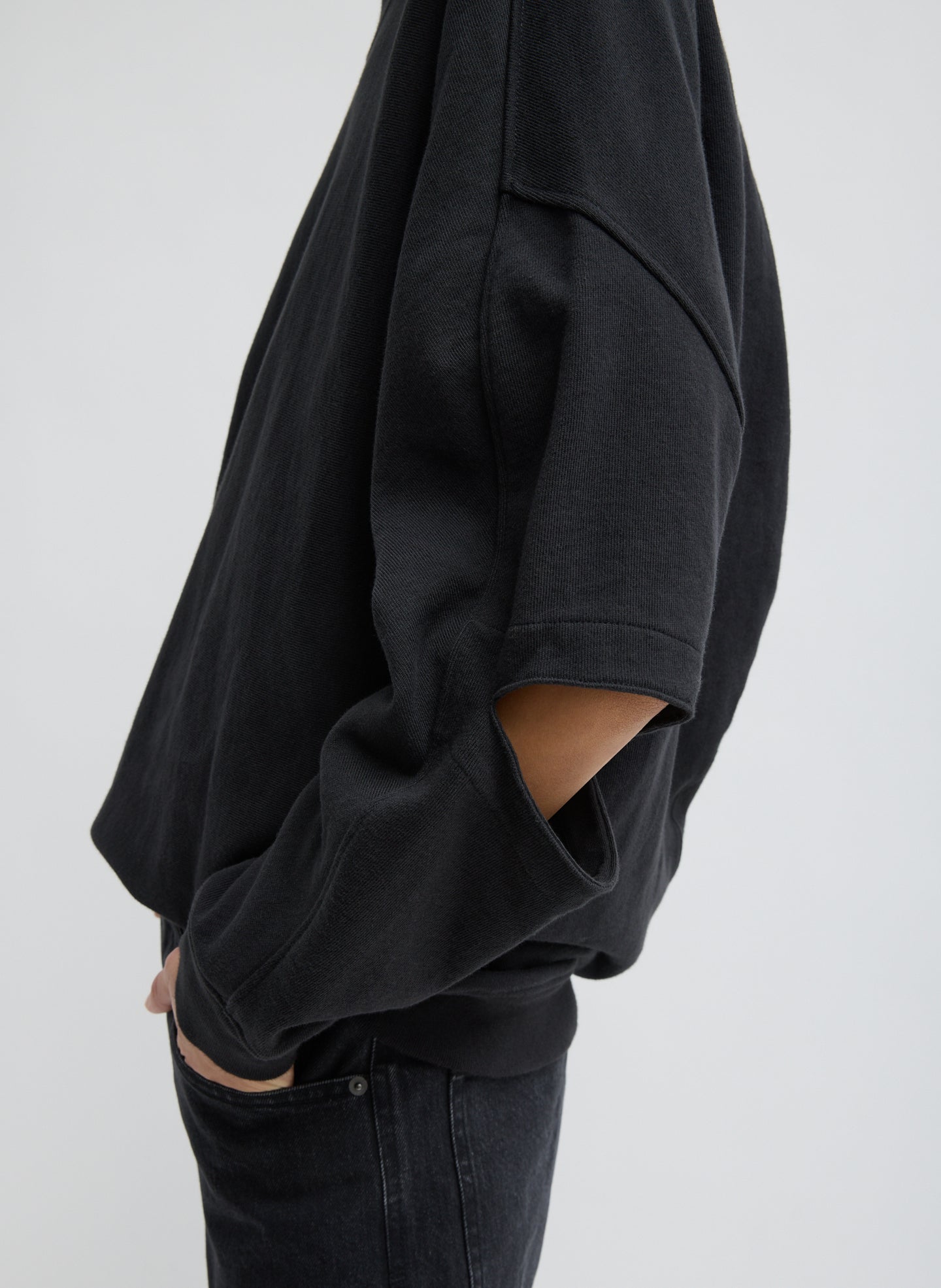 Black Cocoon Crewneck Sweatshirt - closeup of cutout detail at elbow