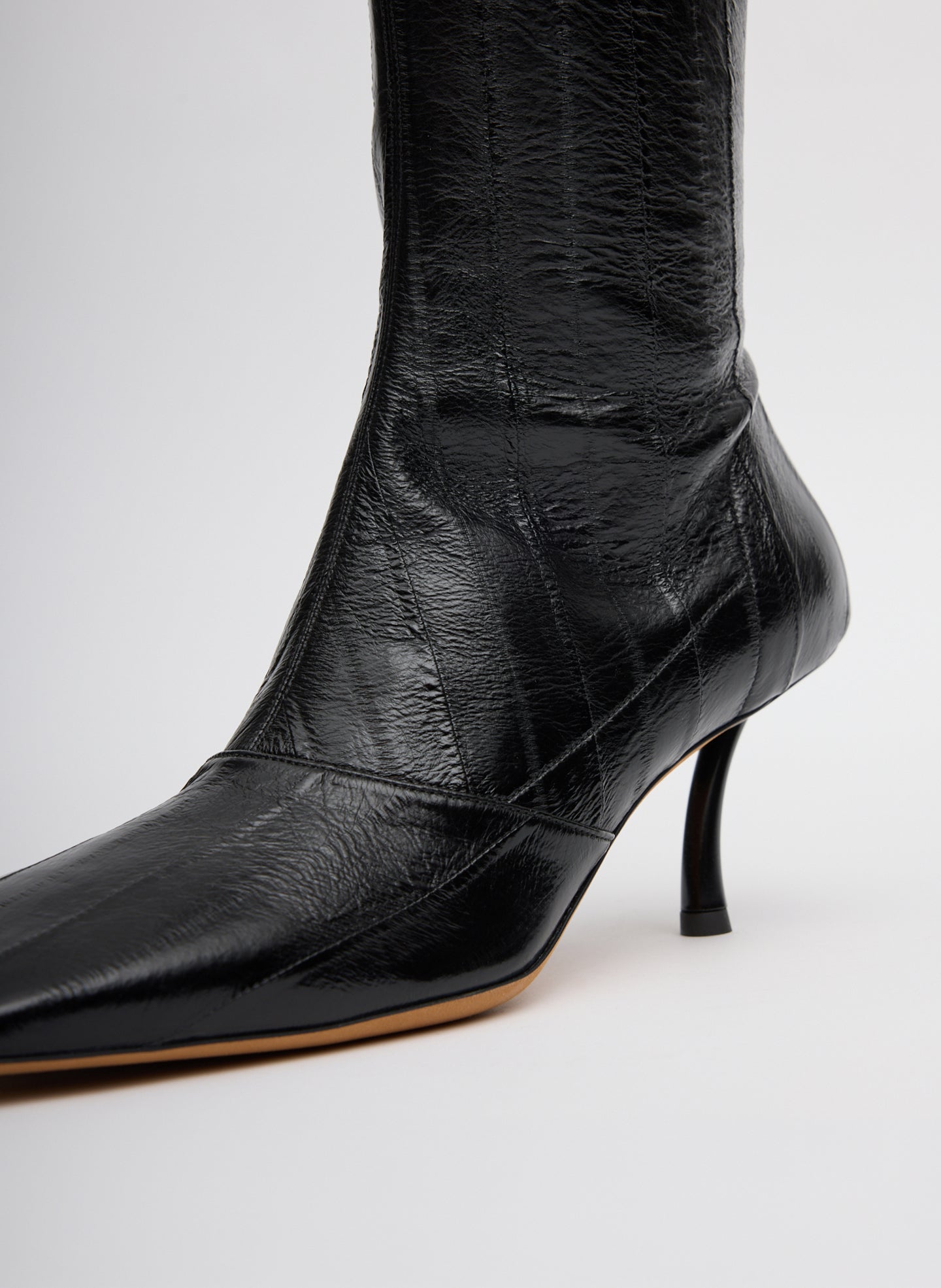 Black Eel Brannon Heeled Boot - tall boot - closeup of eel detail
