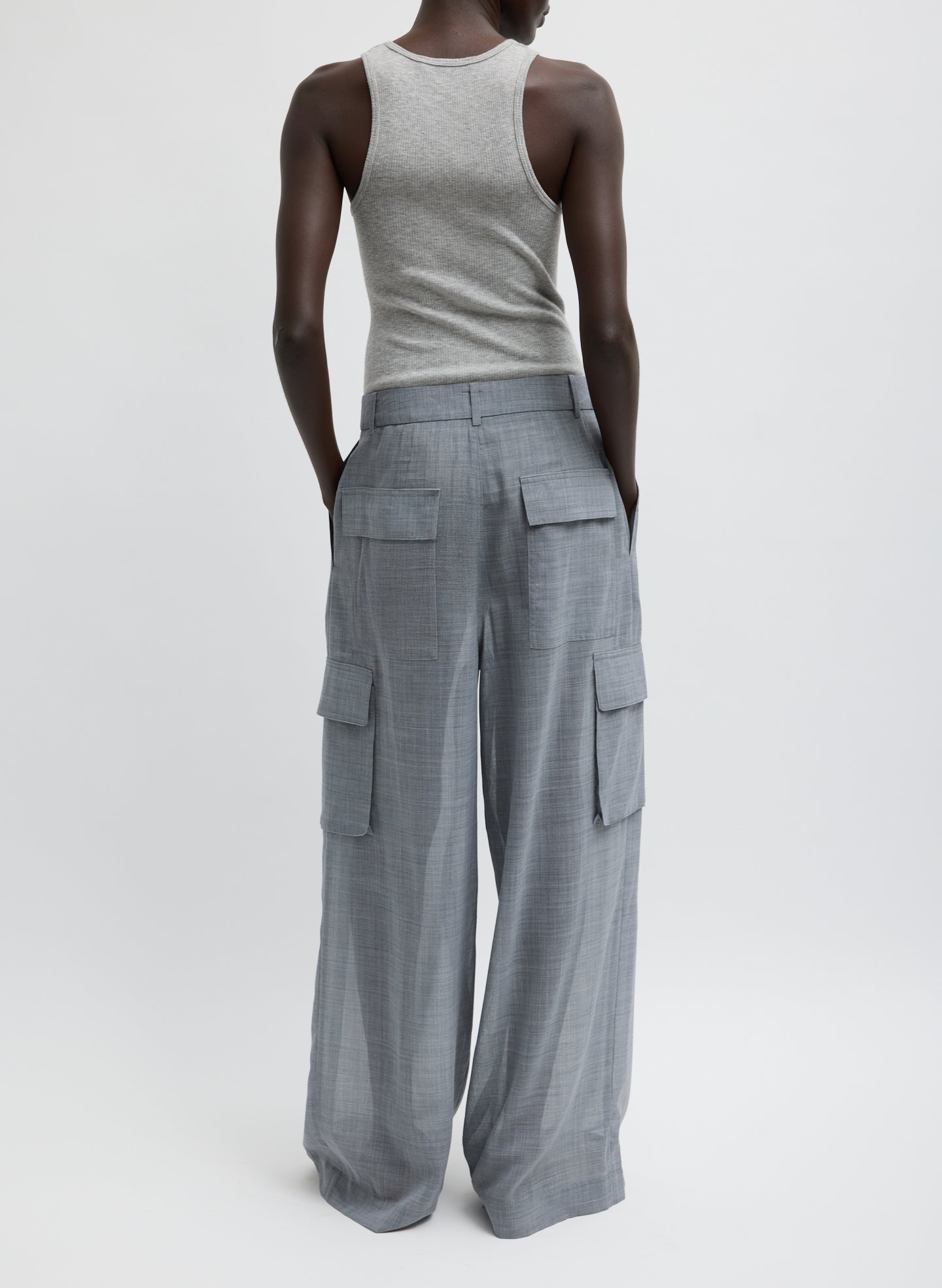 Heather Grey Sheer Wool Gauze Triple Pleat Pant – sheer, back view on model