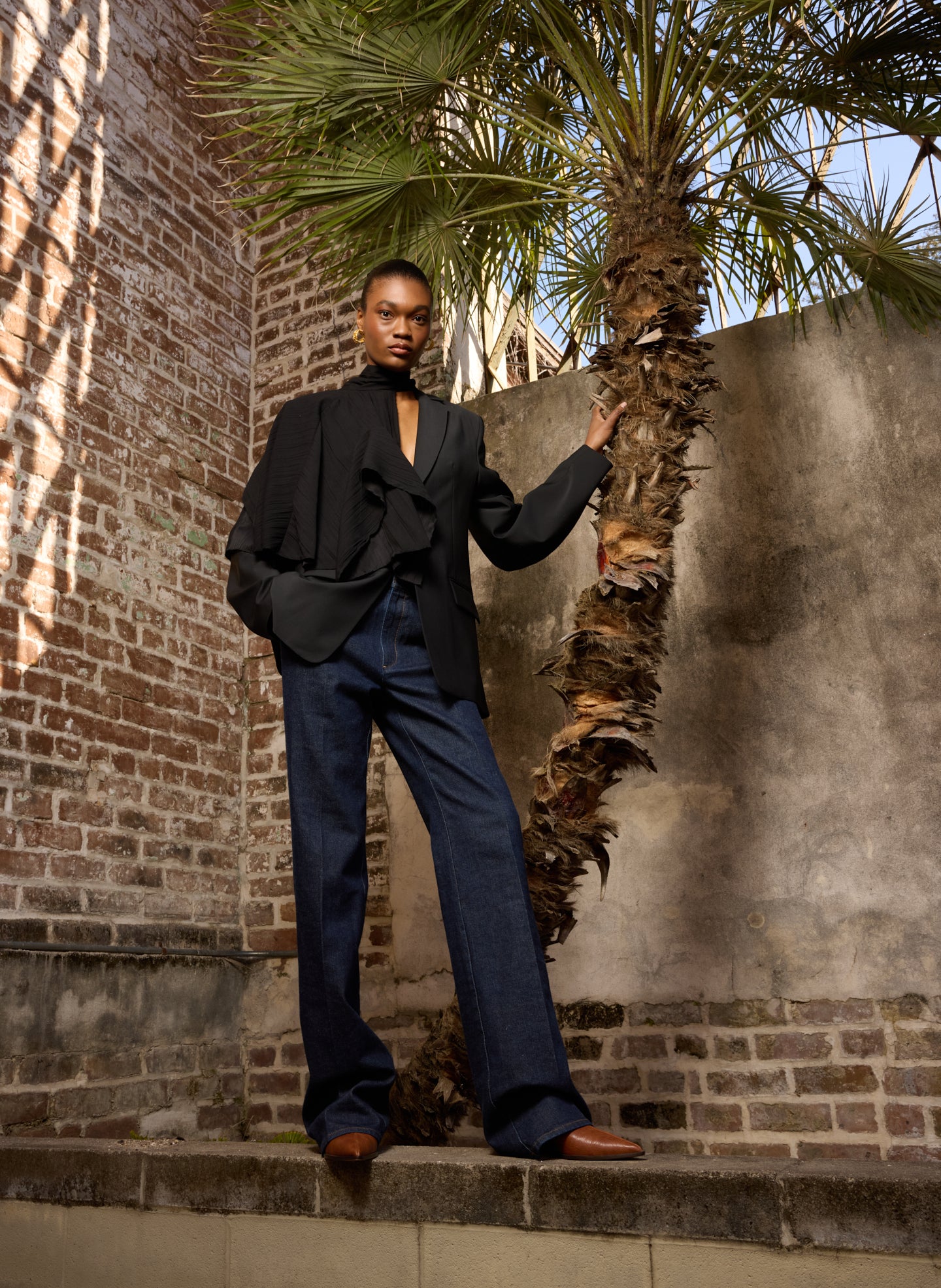 Dark Indigo Denim Pat Trouser Jean - tailored jeans, editorial image on model