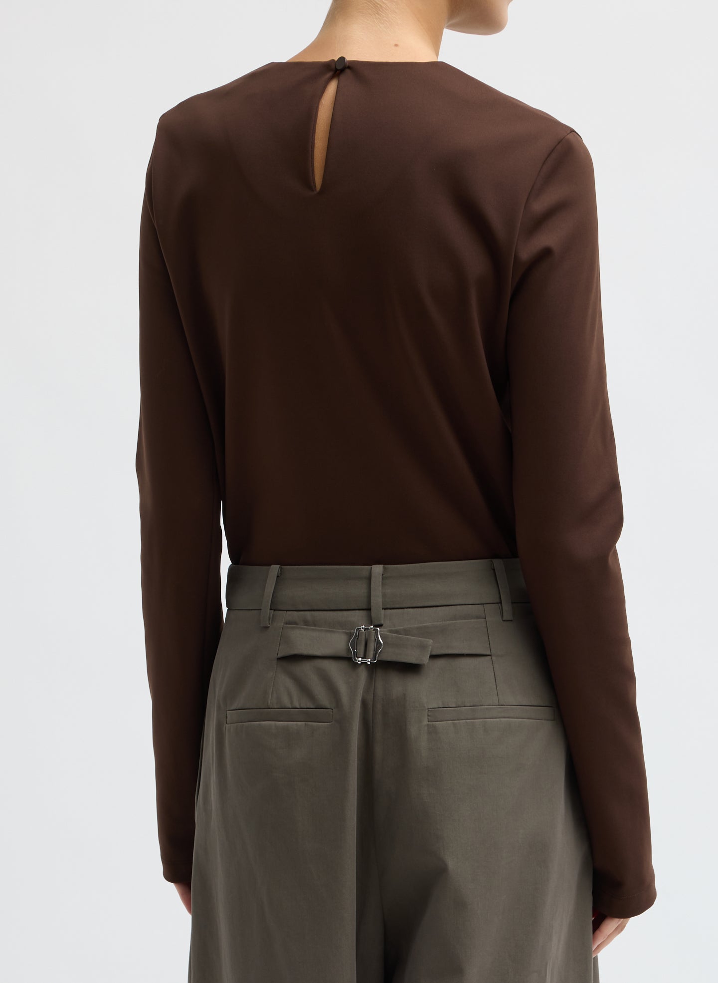 Brown Compact Ultra Stretch Knit Long Sleeve Slim Top - back view on model
