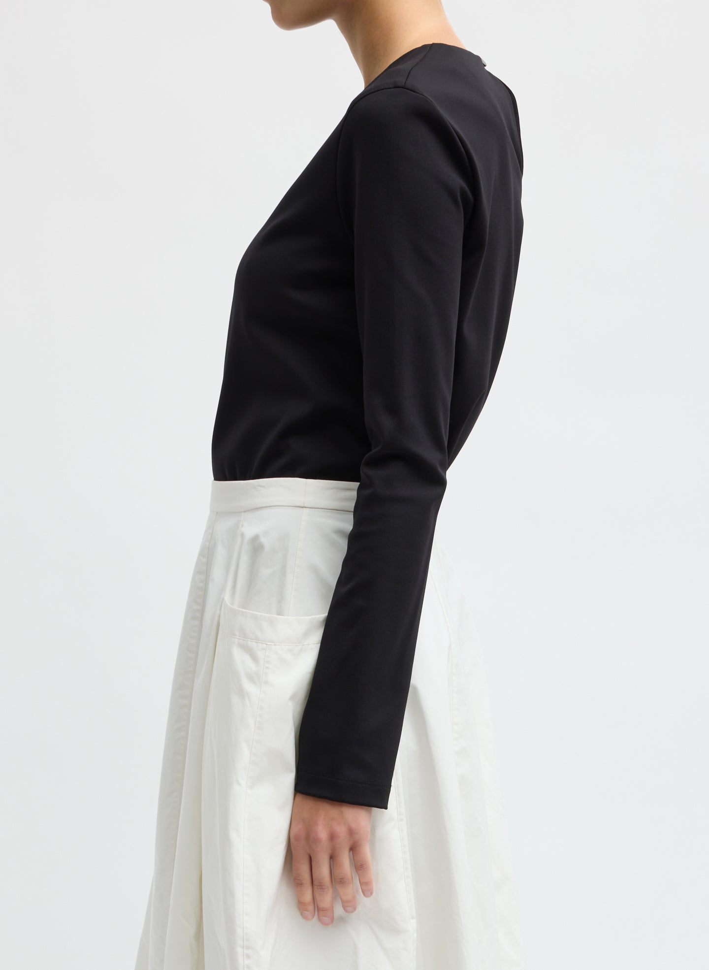 Black Compact Ultra Stretch Knit Long Sleeve Slim Top - side view on model