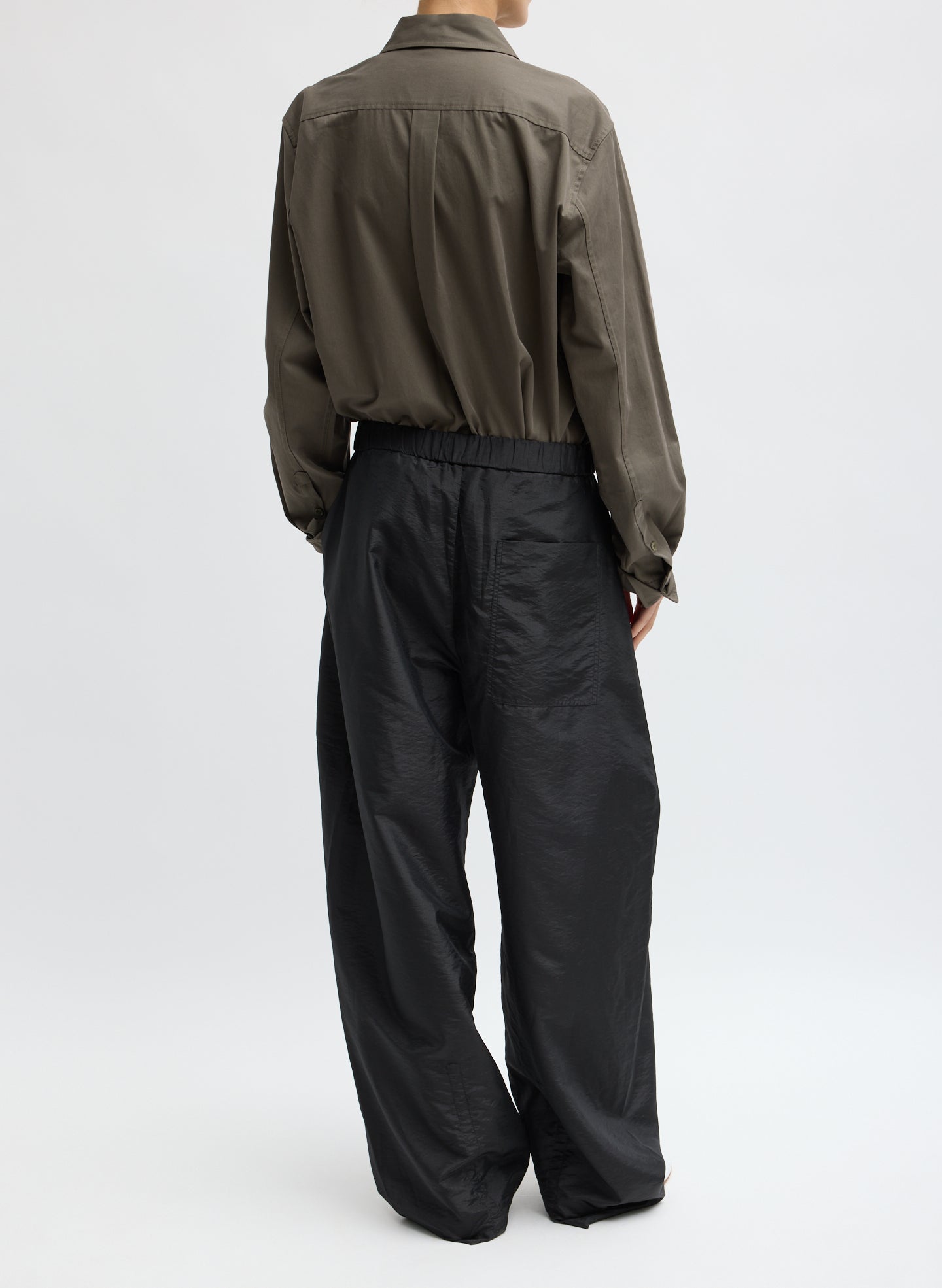 Black Crispy Nylon Winslow Pant - barrel leg pull on pant, back view on model