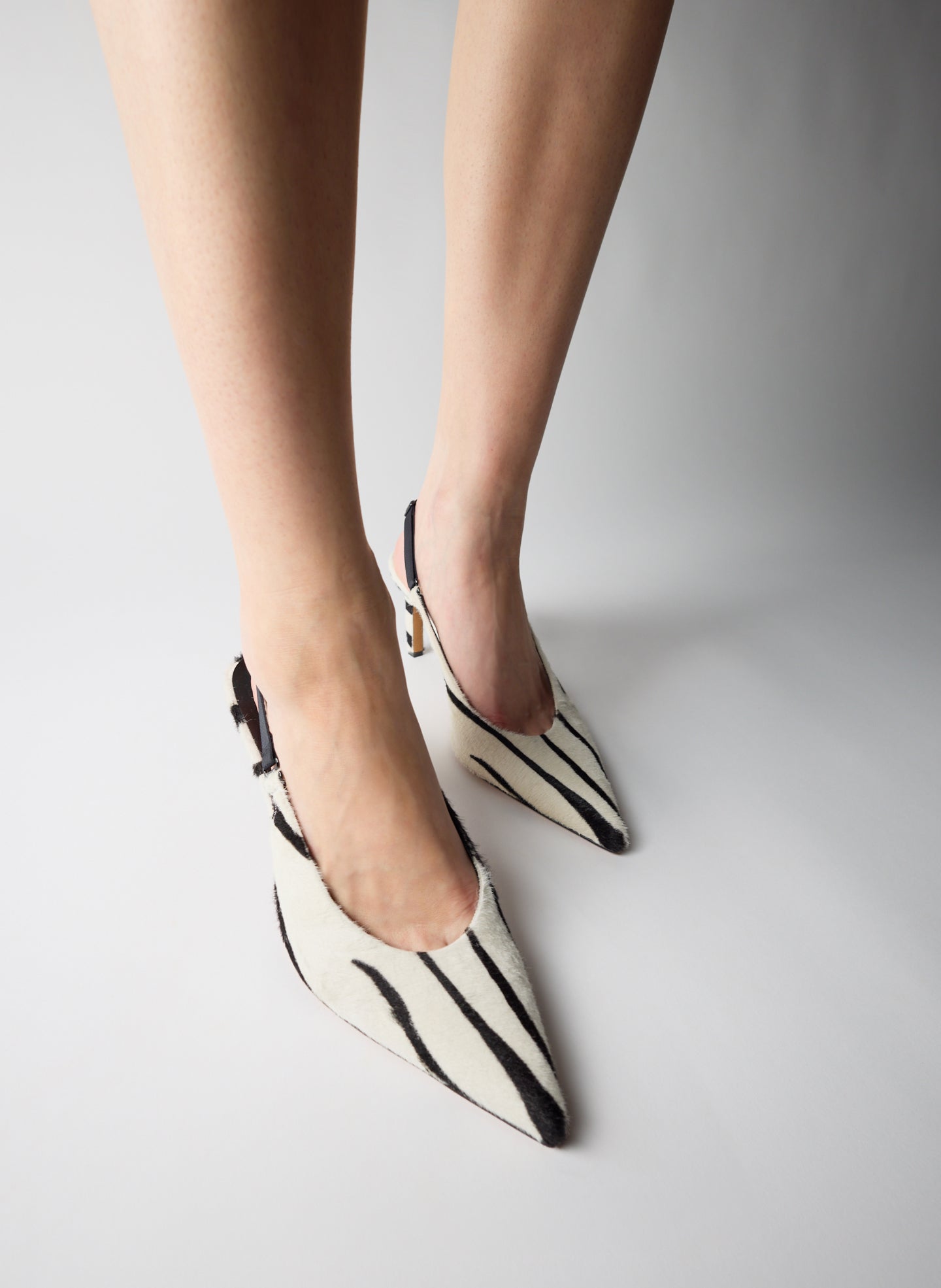Black and White Zebra Print Calf Hair Beasley Pump - on model