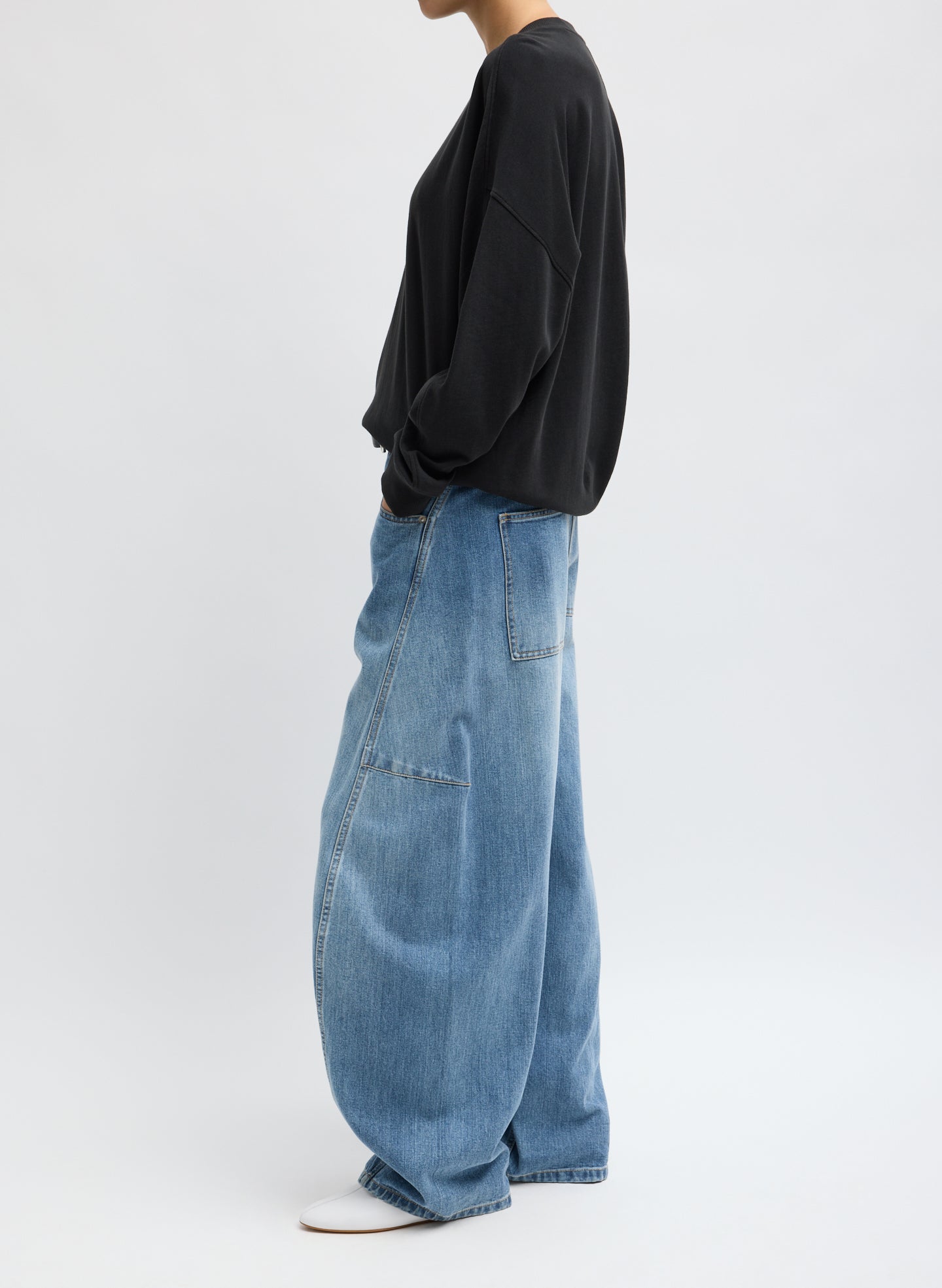 Classic Wash Denim Sid Jean - barrel leg jean, side view on model