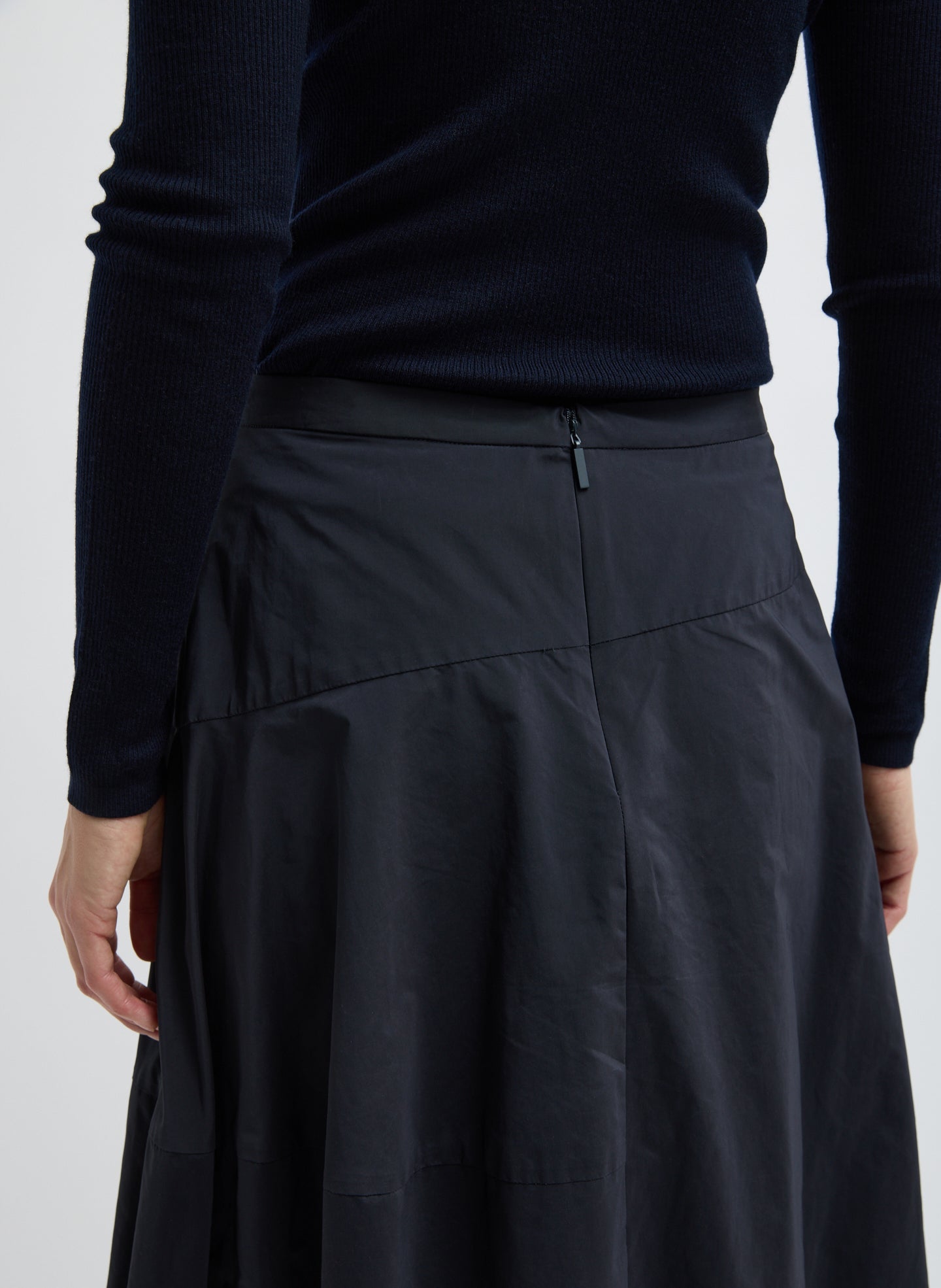Navy Nylon Asymmetrical Balloon Skirt - closeup of zip detail at back