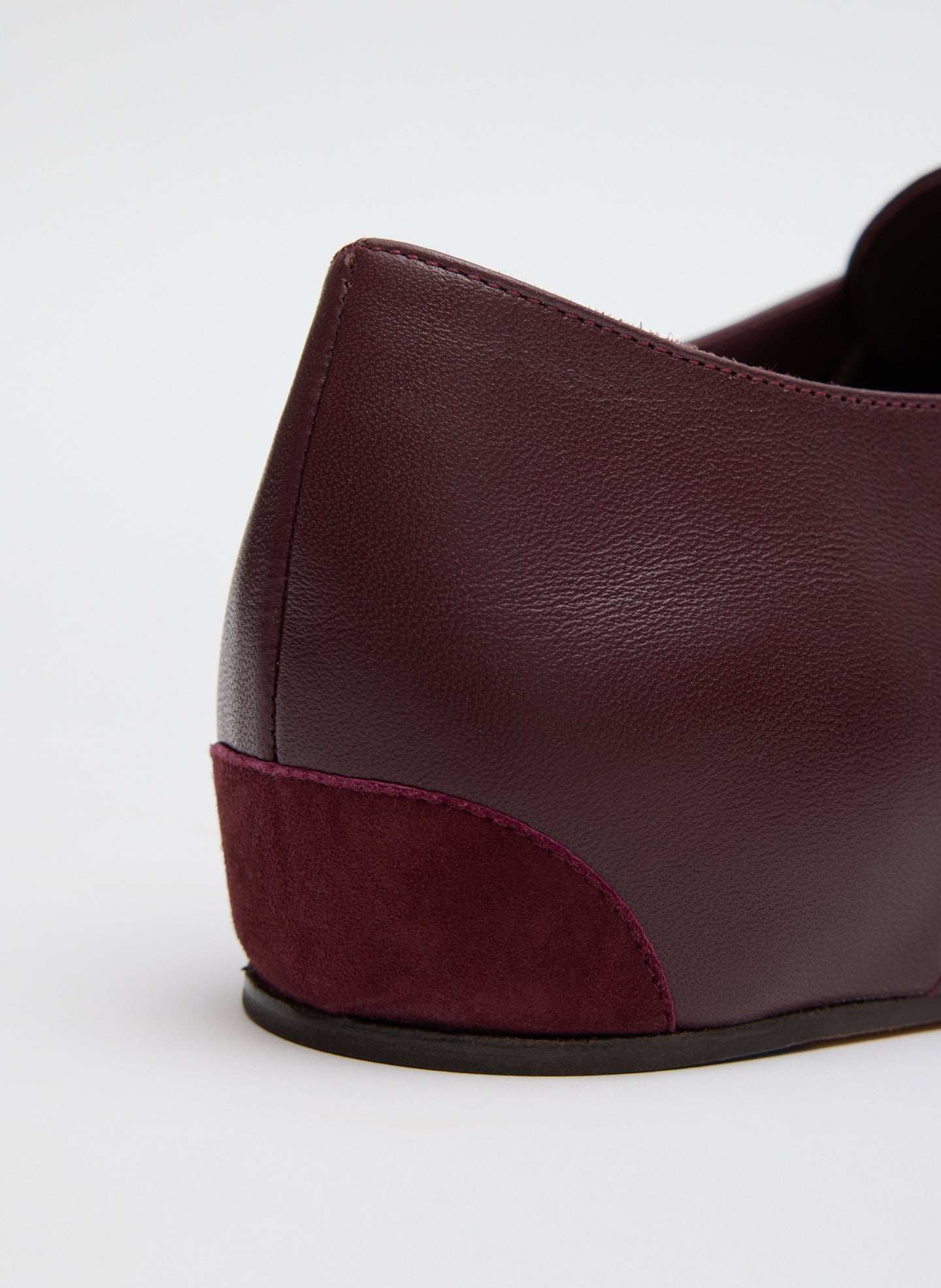 Burgundy Leather Oxford Flats - closeup of leather patch at heel