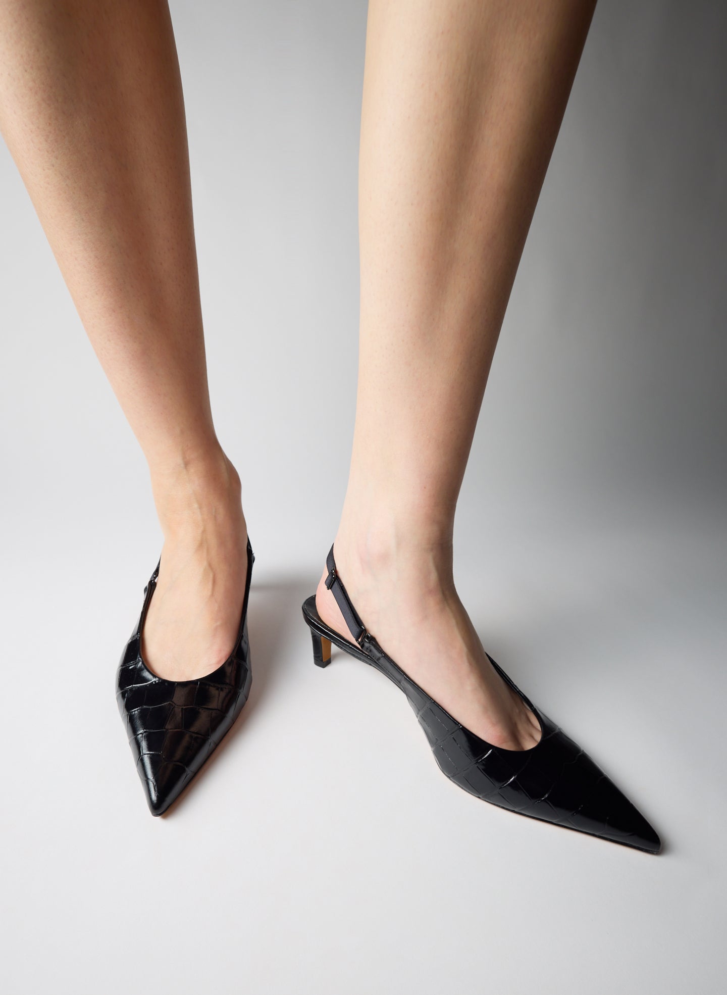 Black Crocodile Embossed Leather Gilbert Low Pump - on model