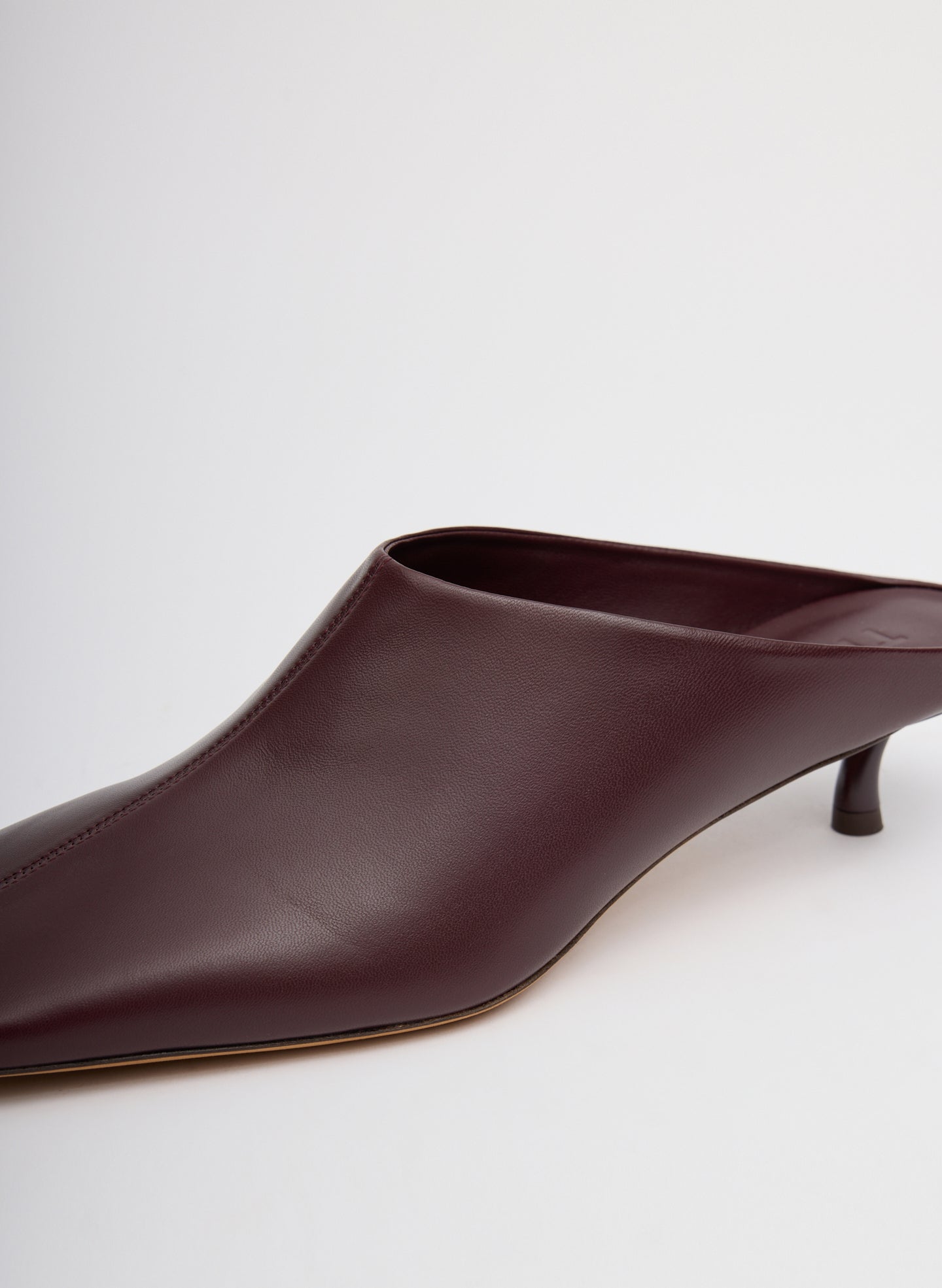 Burgundy Leather Gwinnett Heeled Mule - closeup of nappa leather detail