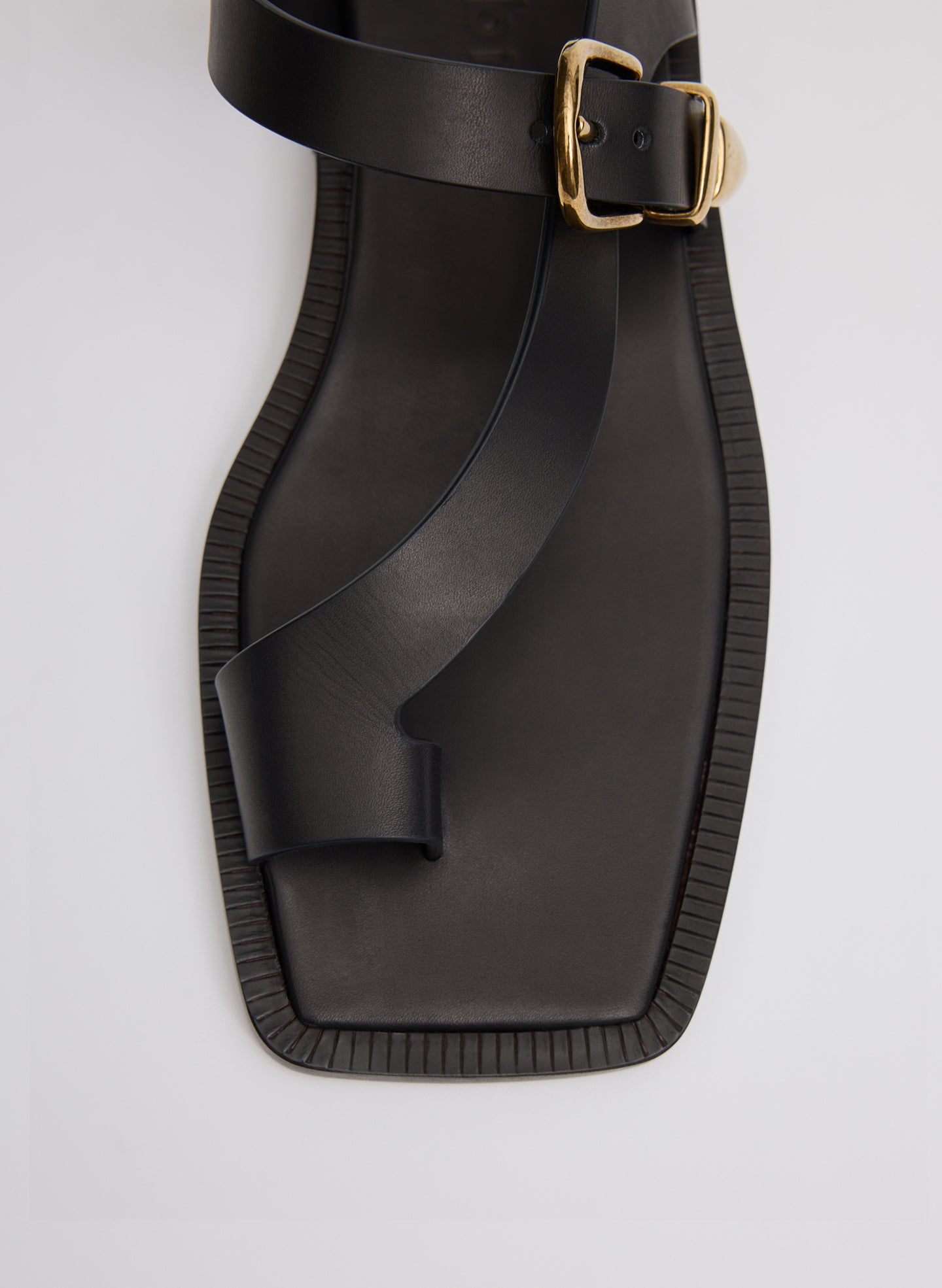 Black Karel Sandal - closeup of toe loop