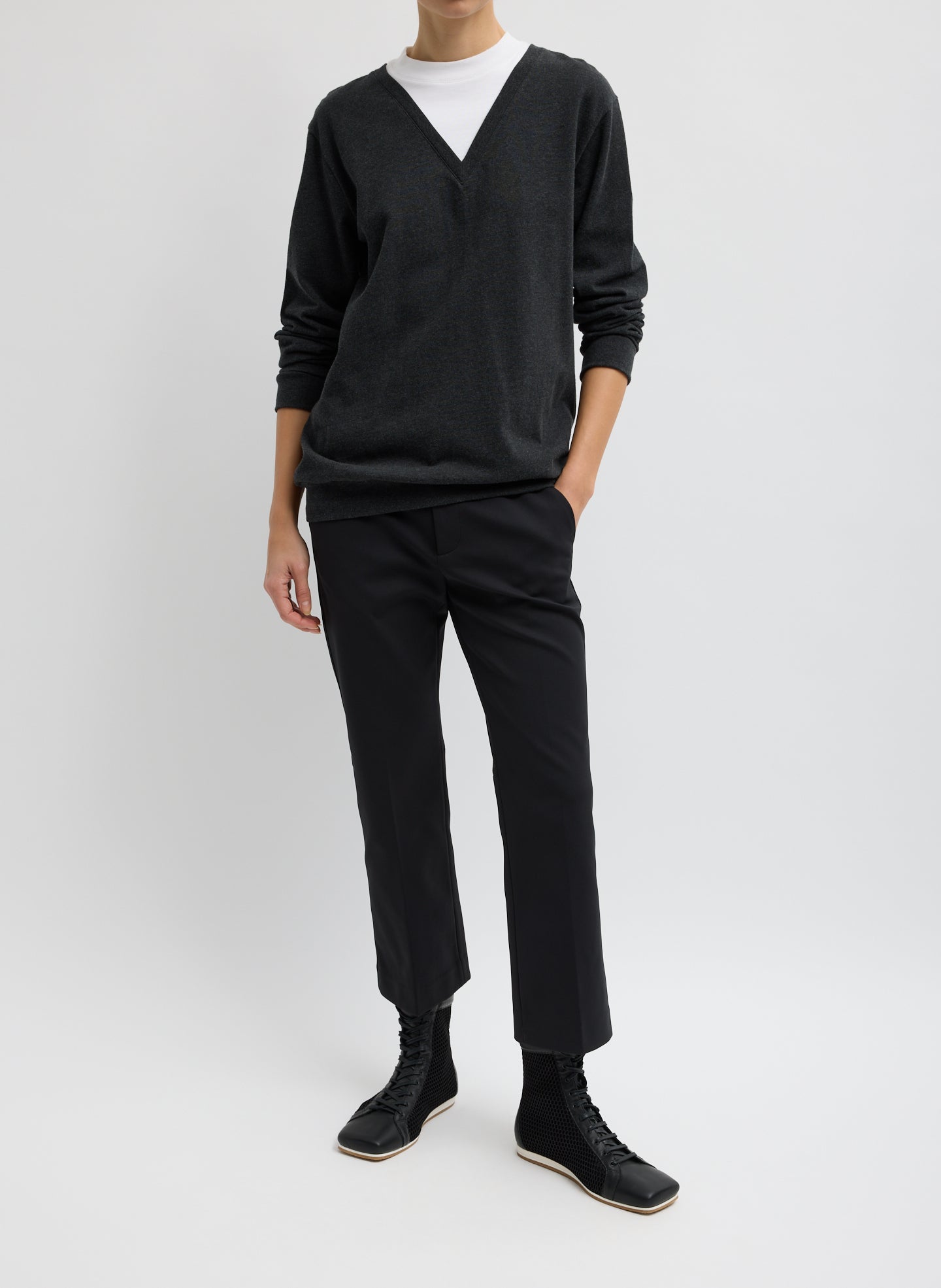 Black Compact Tech Knit Cropped Bootcut Pant - full look, front view on model