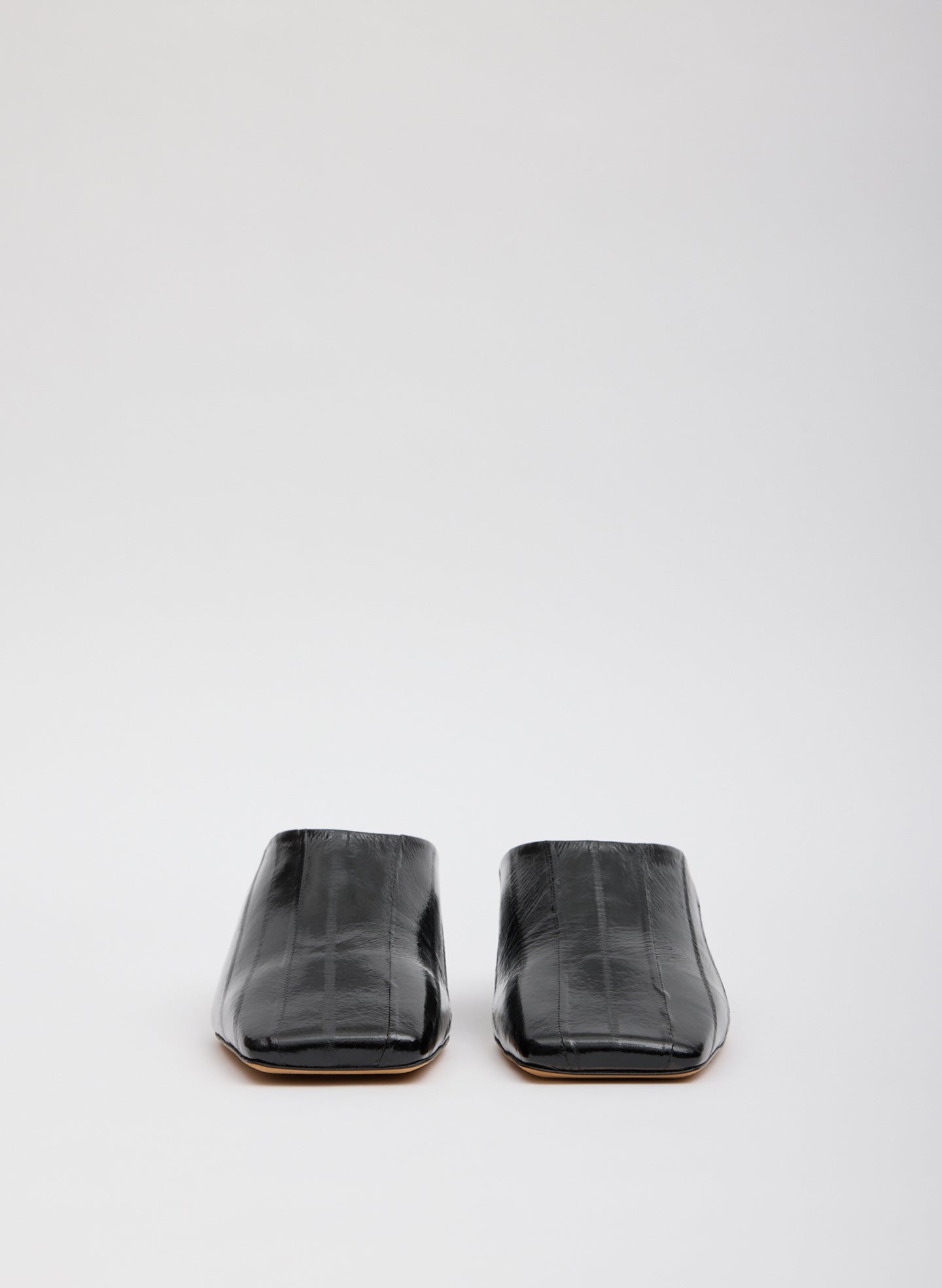 Black Eel Skin Gwinnett Heeled Mules - front view