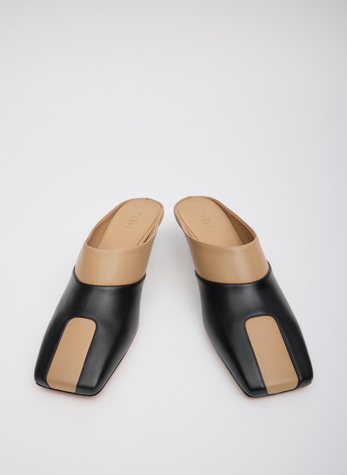 Two Tone Beige and Black Leather Gwinnett Heeled Mules - front view