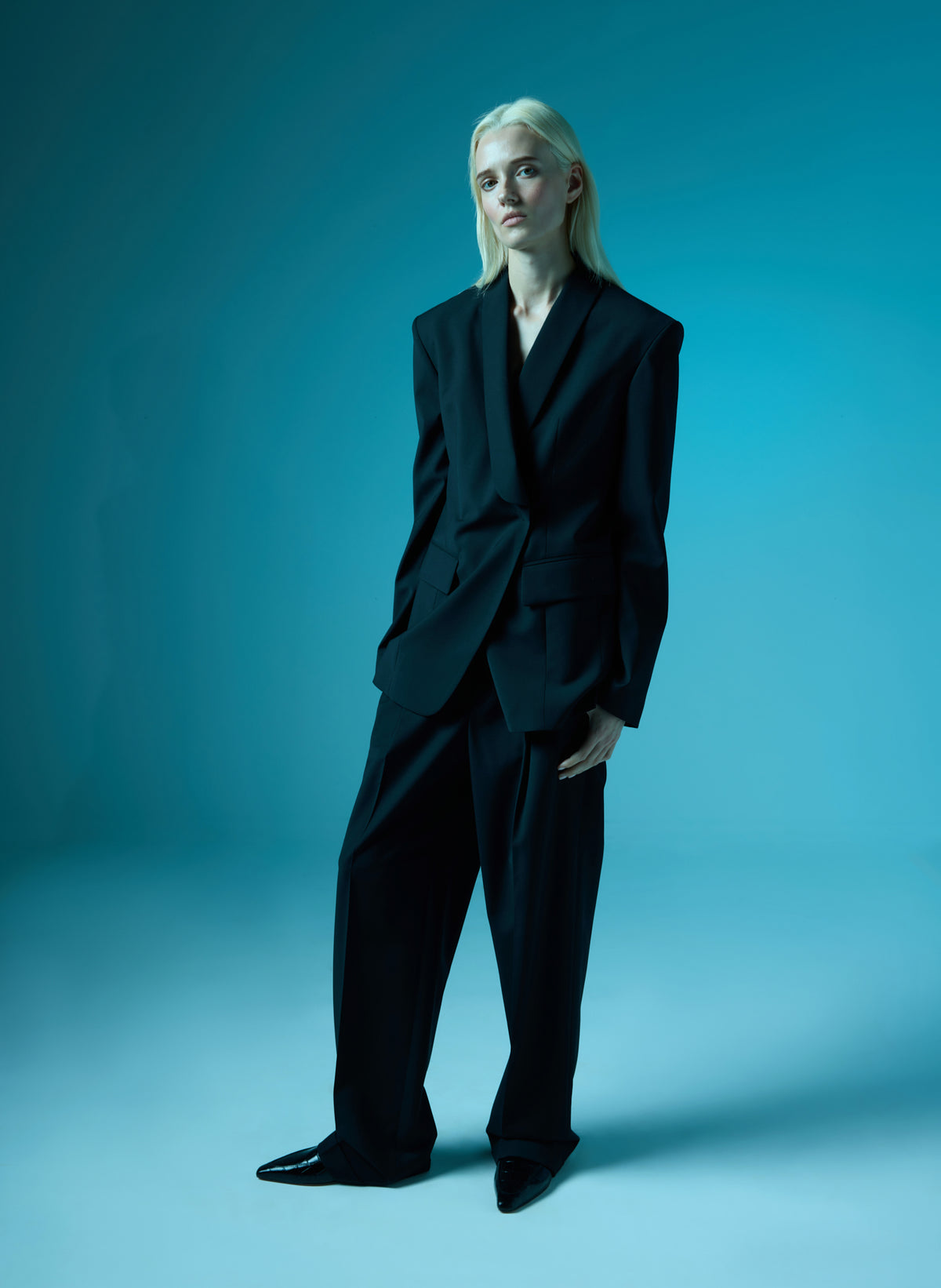 Black Recycled Tropical Wool Tuxedo Zip Blazer - editorial image on model