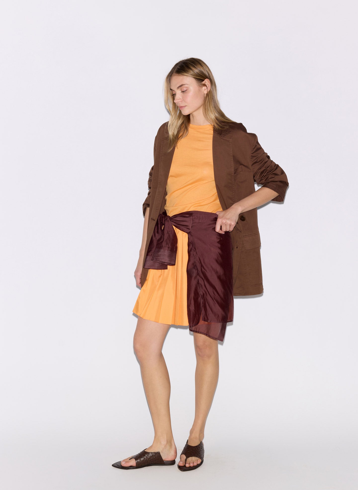 Orange Summer Nylon Pleated Mini Skirt - editorial image on model