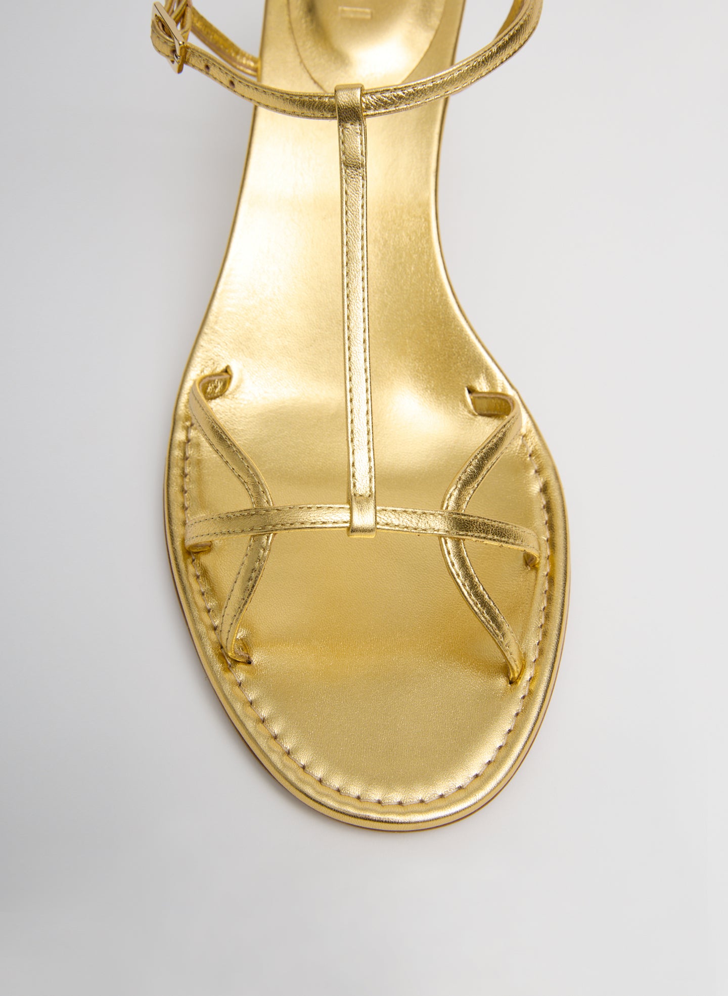 Gold Milbourne Metallic Nappa Heel - closeup of strap detail at front