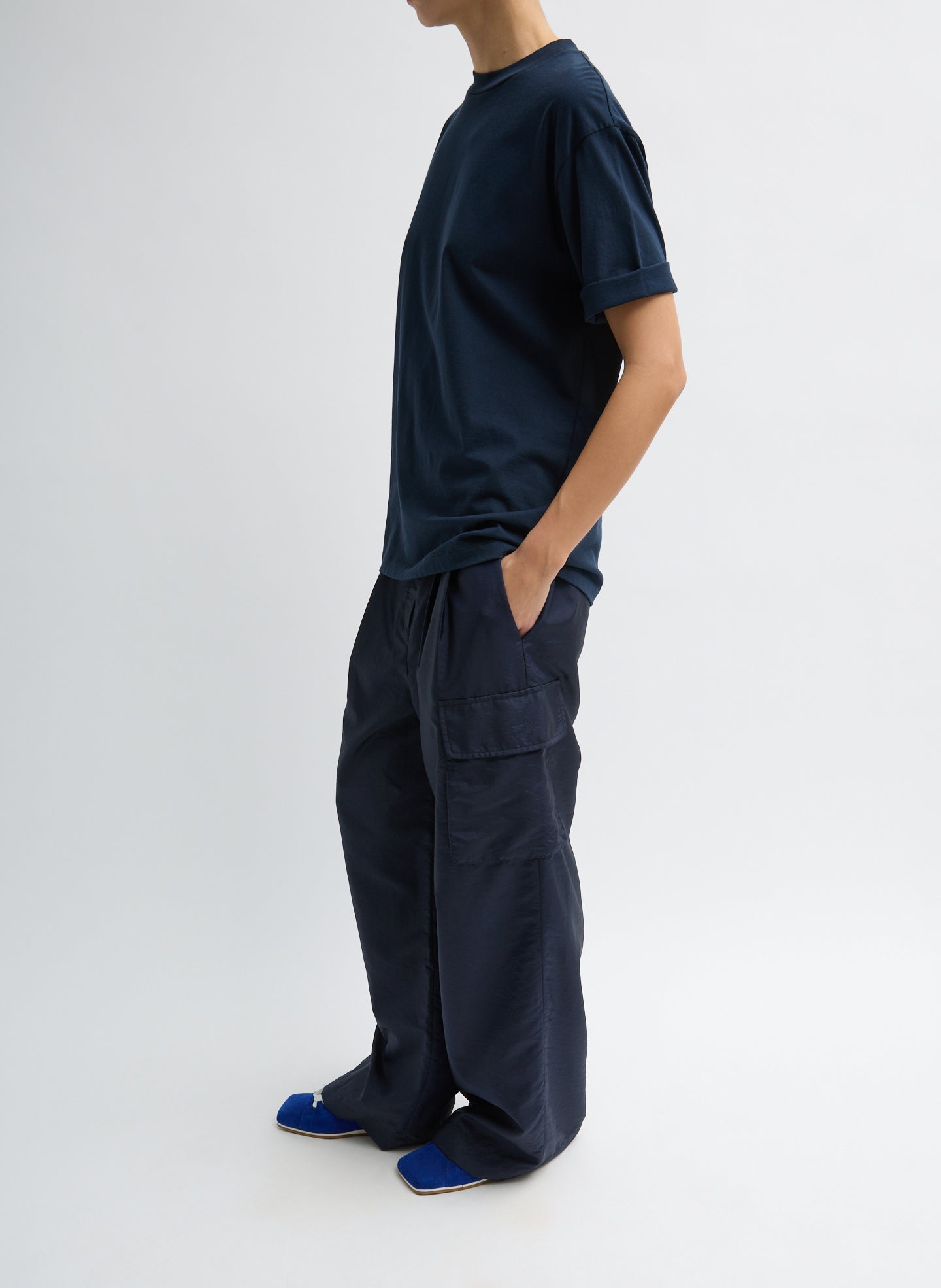 Navy Crispy Nylon Stella Pleated Cargo Pant - oversized fit, side view on model