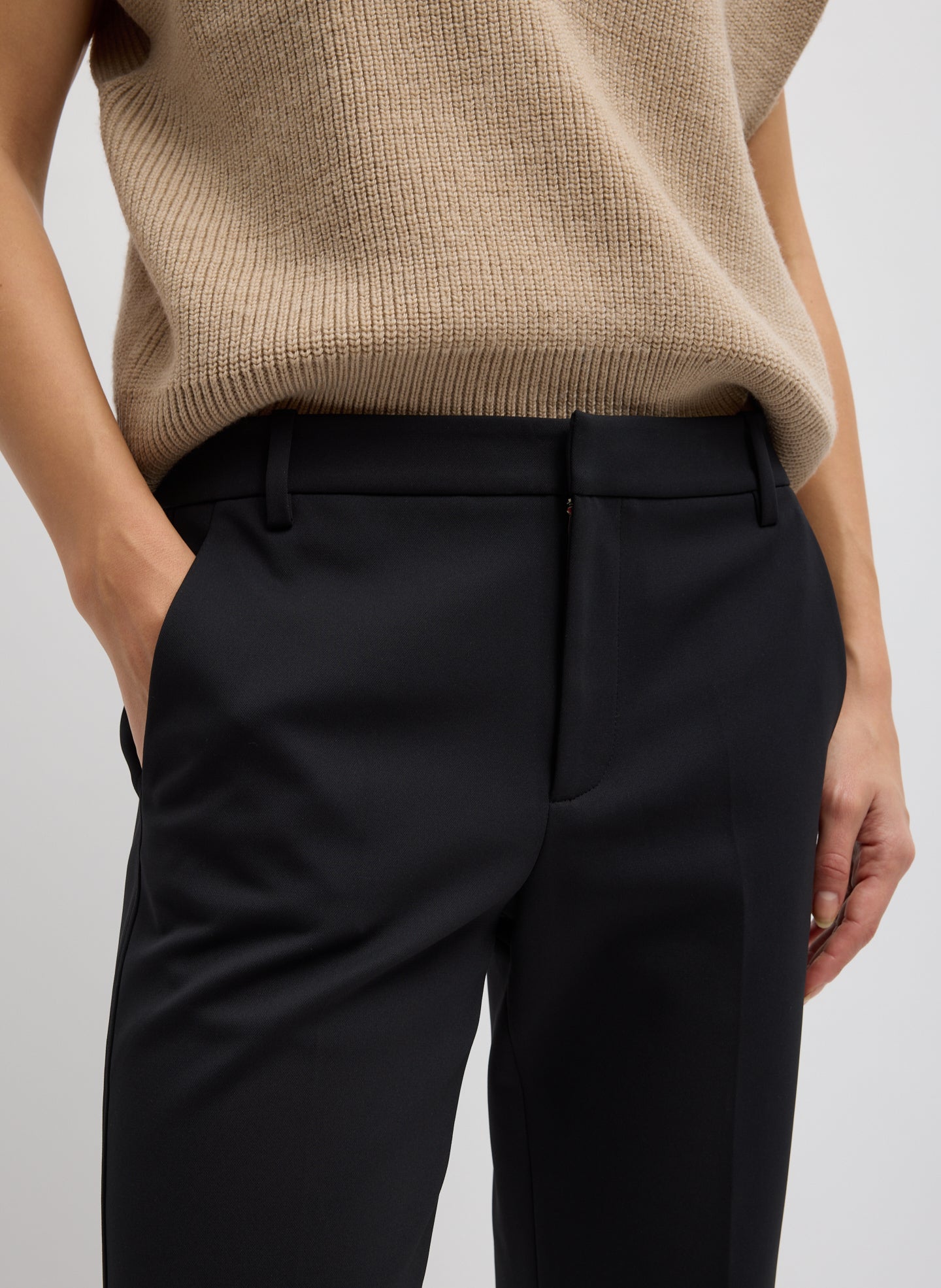 Black Compact Tech Knit Cropped Bootcut Pant - closeup of waistband