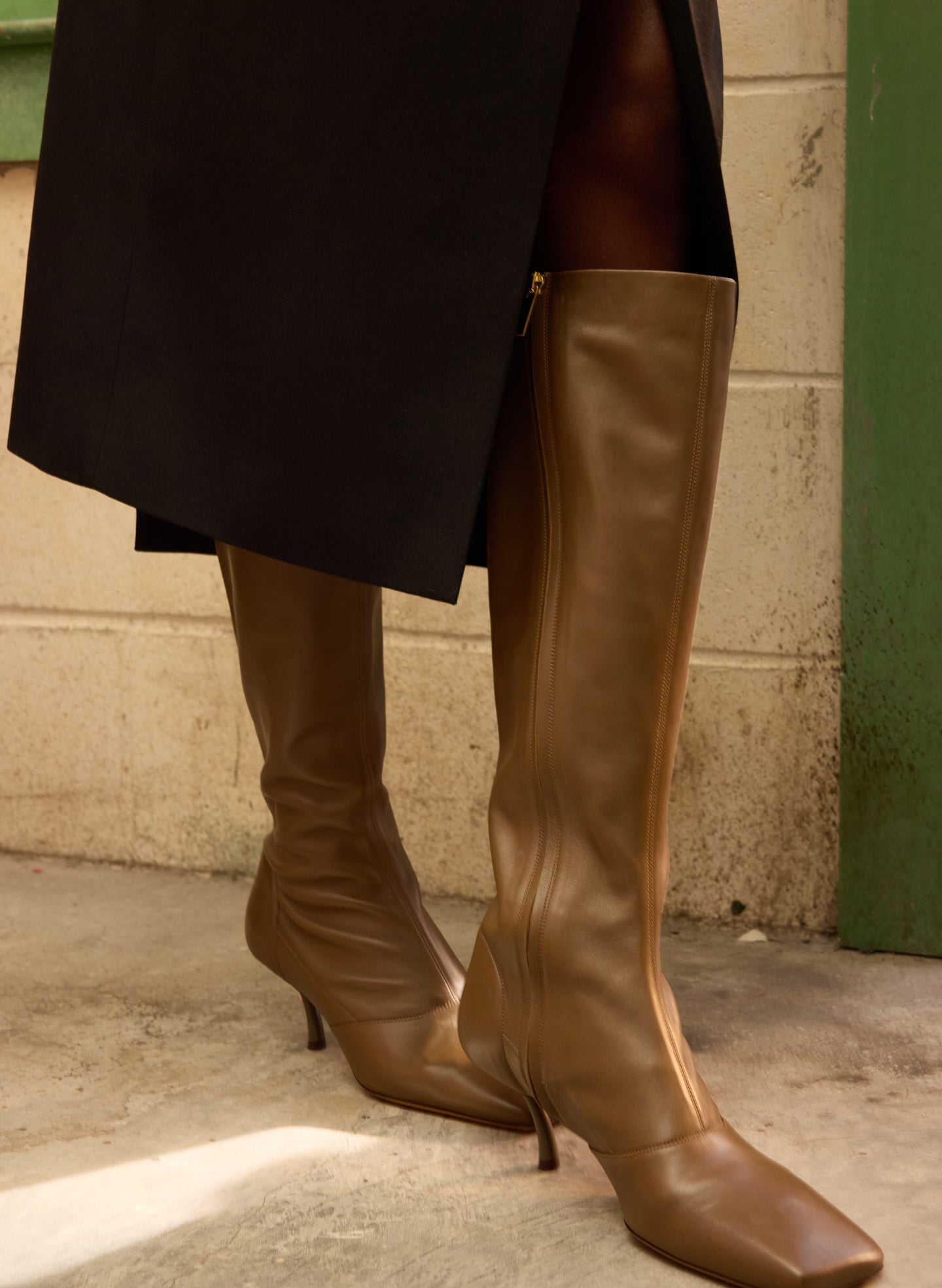 Brannon Leather Heeled Boot - tall boot - editorial image on model
