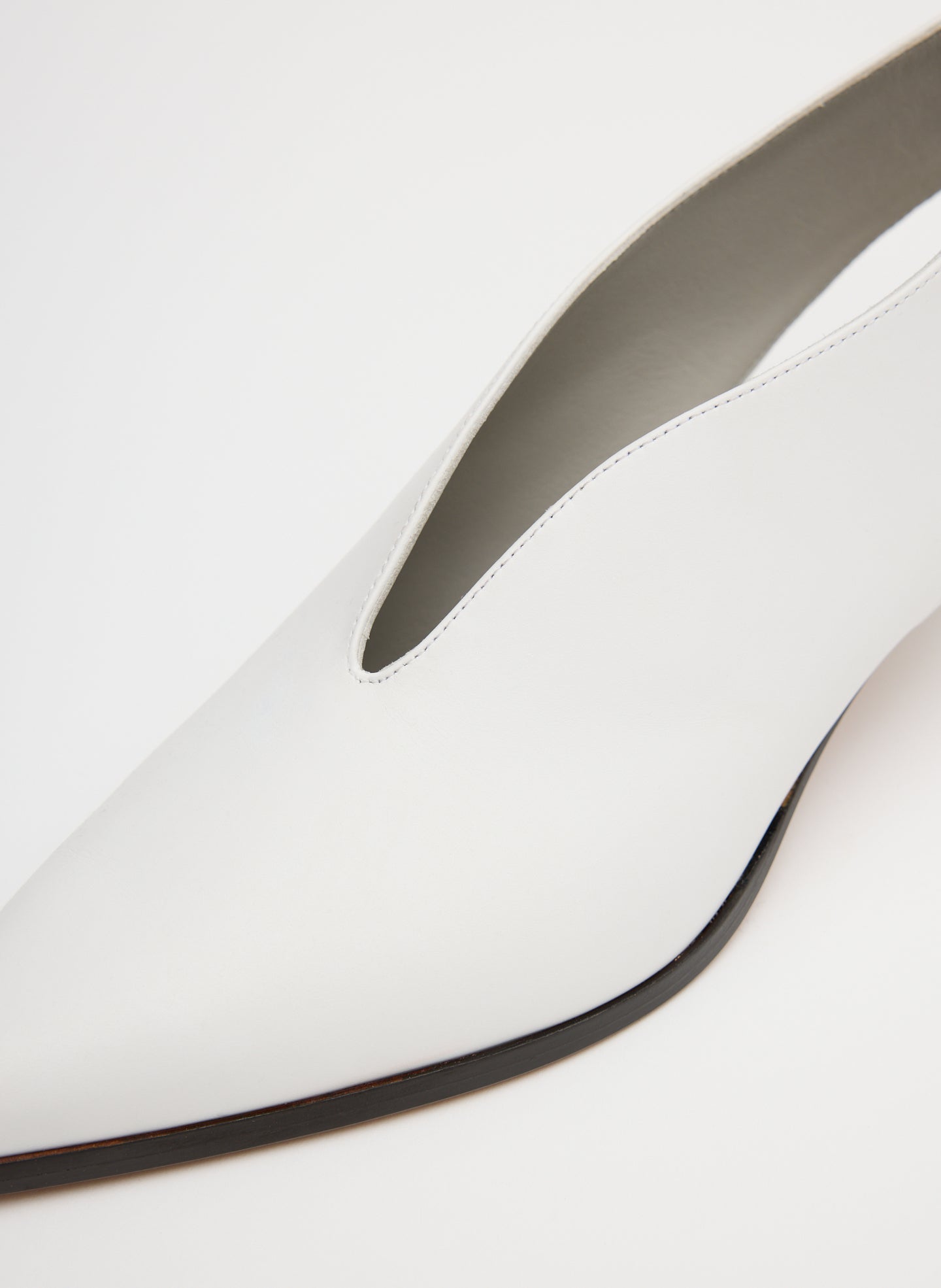 White Hans Bootie - closeup of v-cut vamp detail