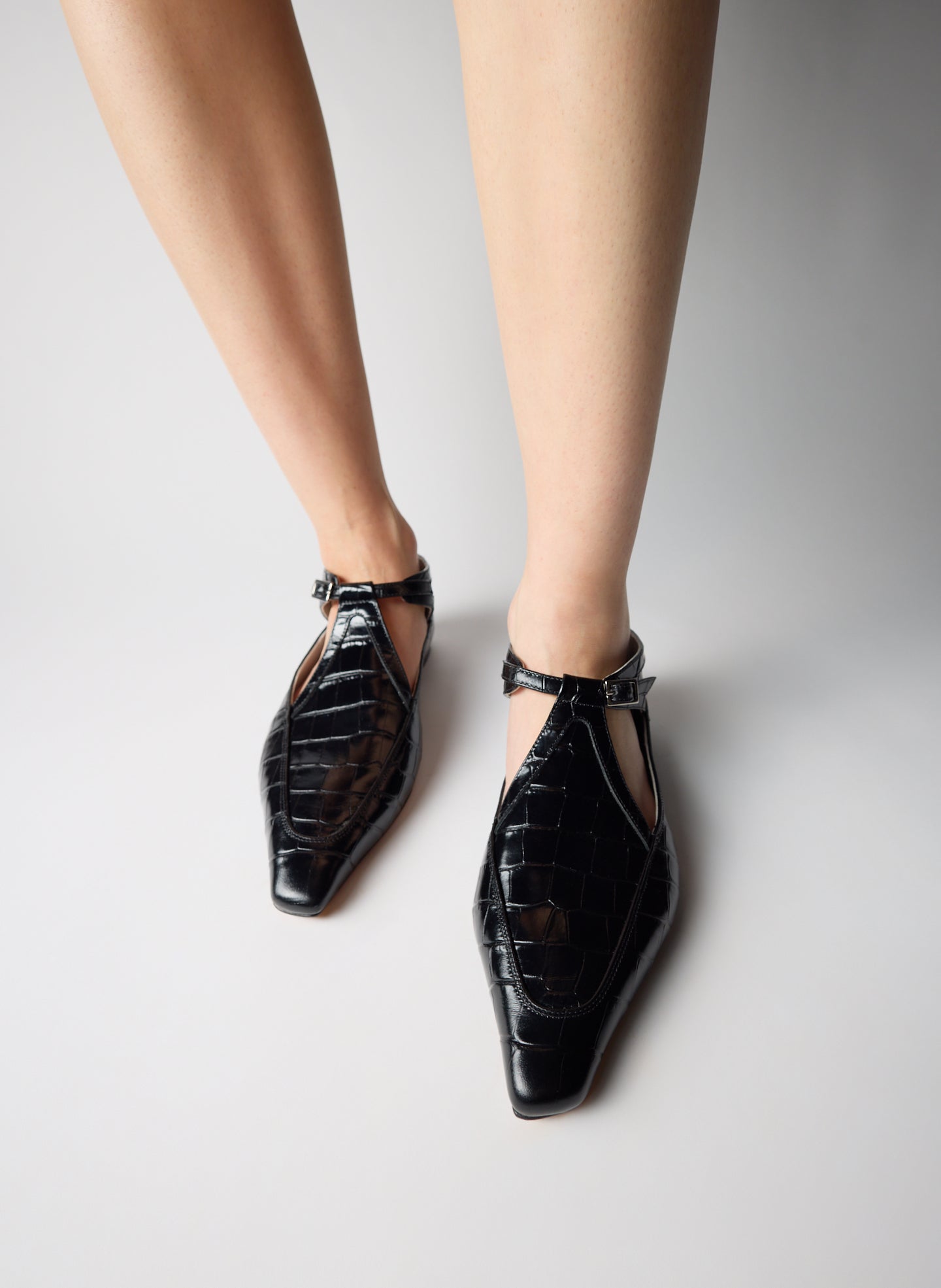 Black Crocodile Embossed Somerset Flat - pointed toe flat, on model